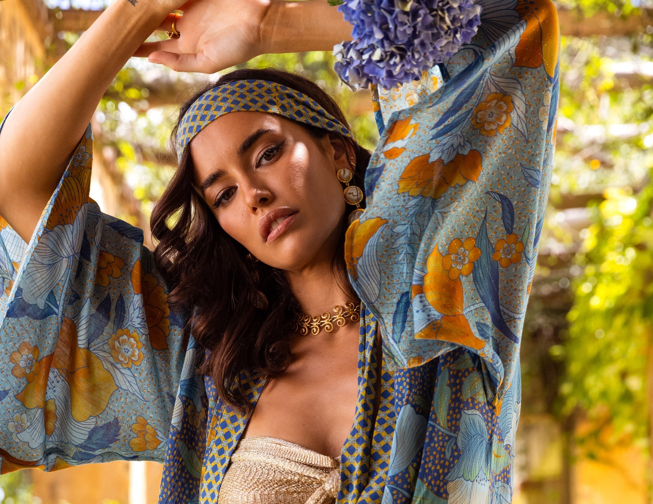 Wearing a kimono with a tree background