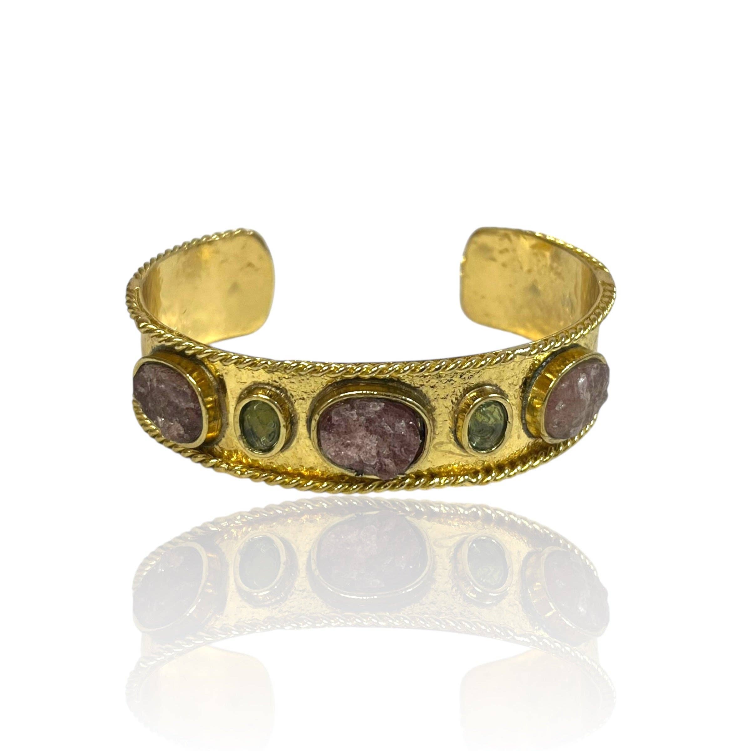 Smoky Quartz Gem Cuff with raw smoky quartz and green stones set in textured gold-tone metal band