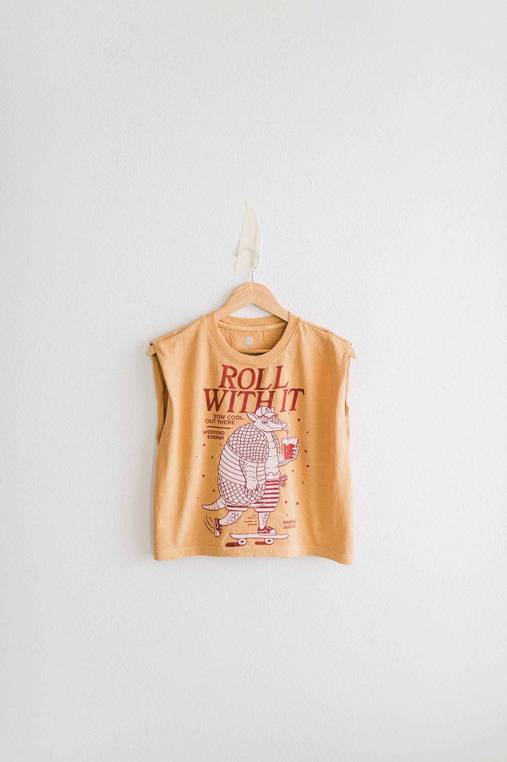 Roll with it armadillo | faded mustard boxy muscle tee