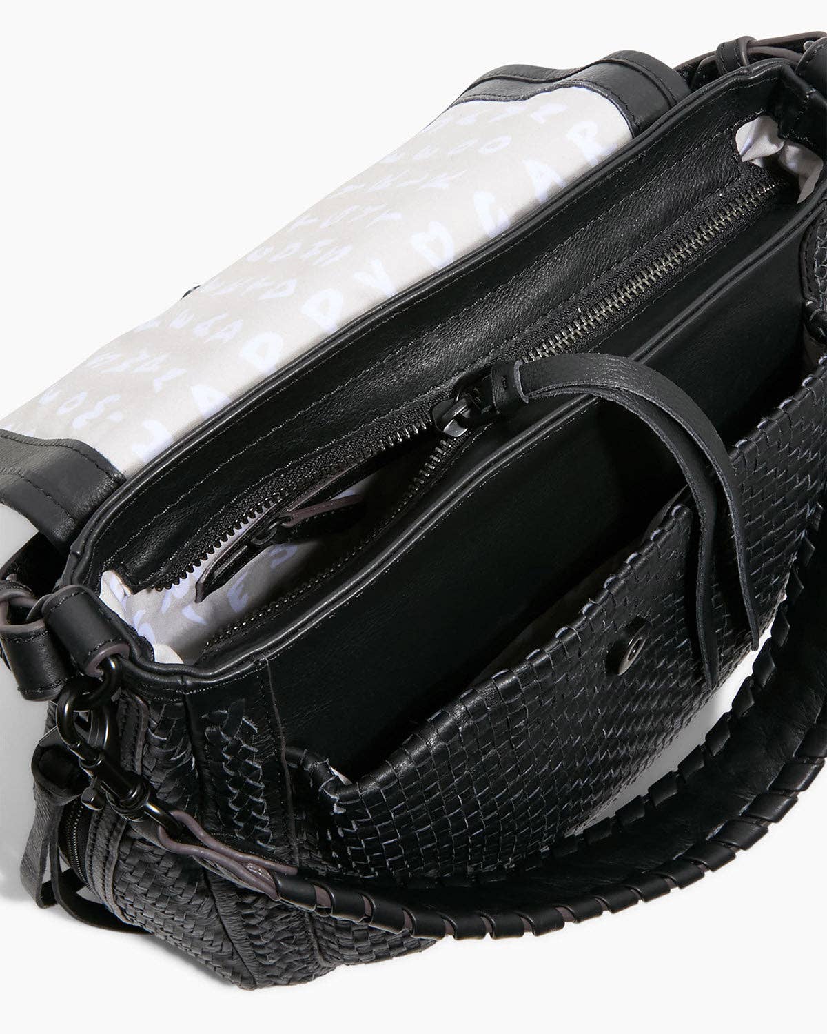 All For Love Novelty Zip Top Convertible Shoulder bag interior showing multiple compartments and woven leather detail