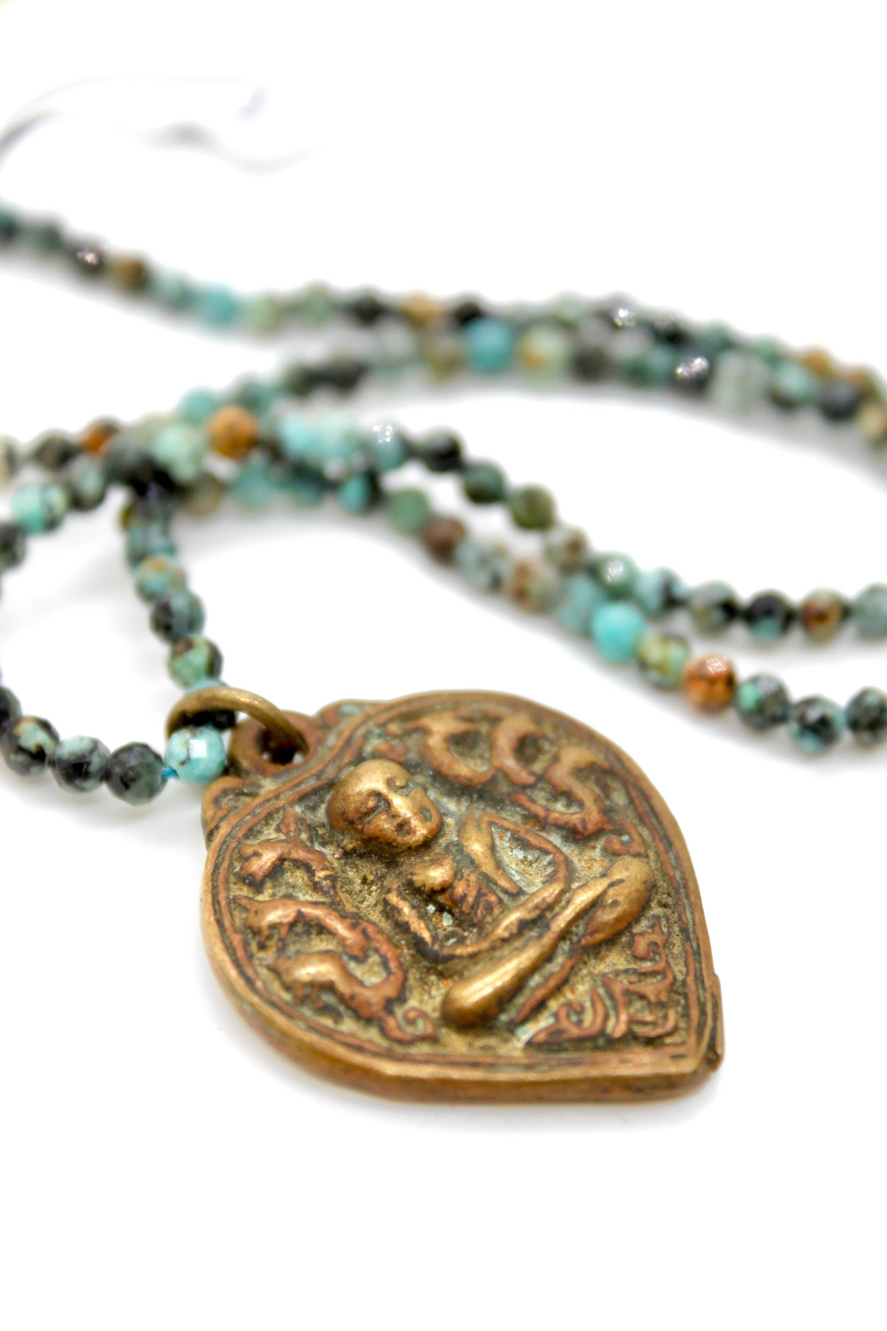 Buddha Necklace 117 - Faceted African Turquoise Necklace with brass Buddha pendant and multicolored turquoise beads