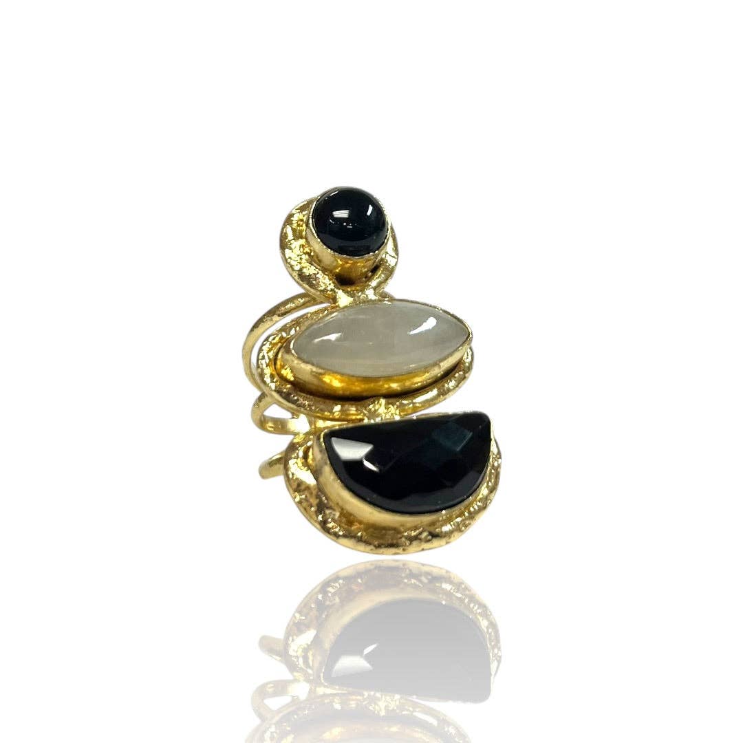 Elegant gold-tone Cocktail Rings with black and white stones in artistic statement design