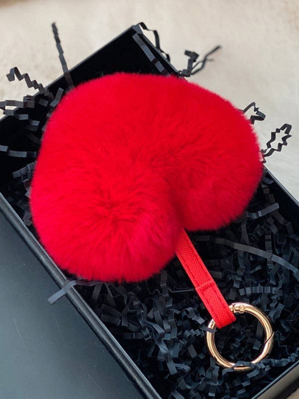 Heart Shape Bag Charm Keychain in bright red fluffy material with gold metal ring and black decorative filler in box