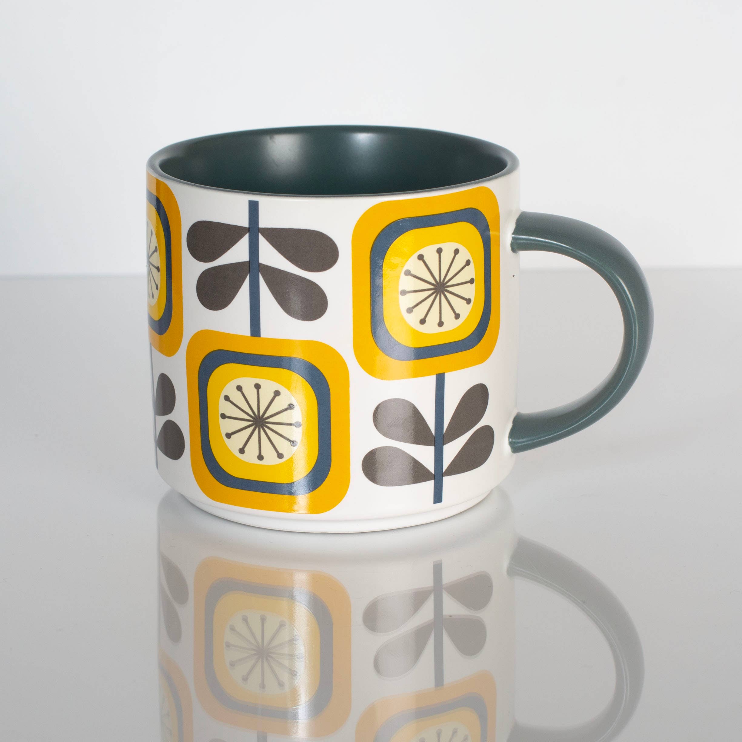 Sunflower Fall Mid Century Modern Stackable Matte Coffee Mug with yellow floral retro design and dark green handle and interior