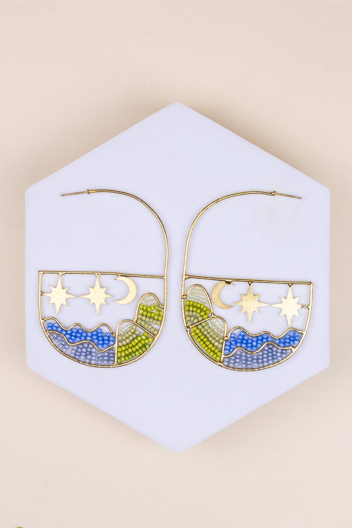 Brea Landscape Hoops with colorful enamel stars and wave patterns