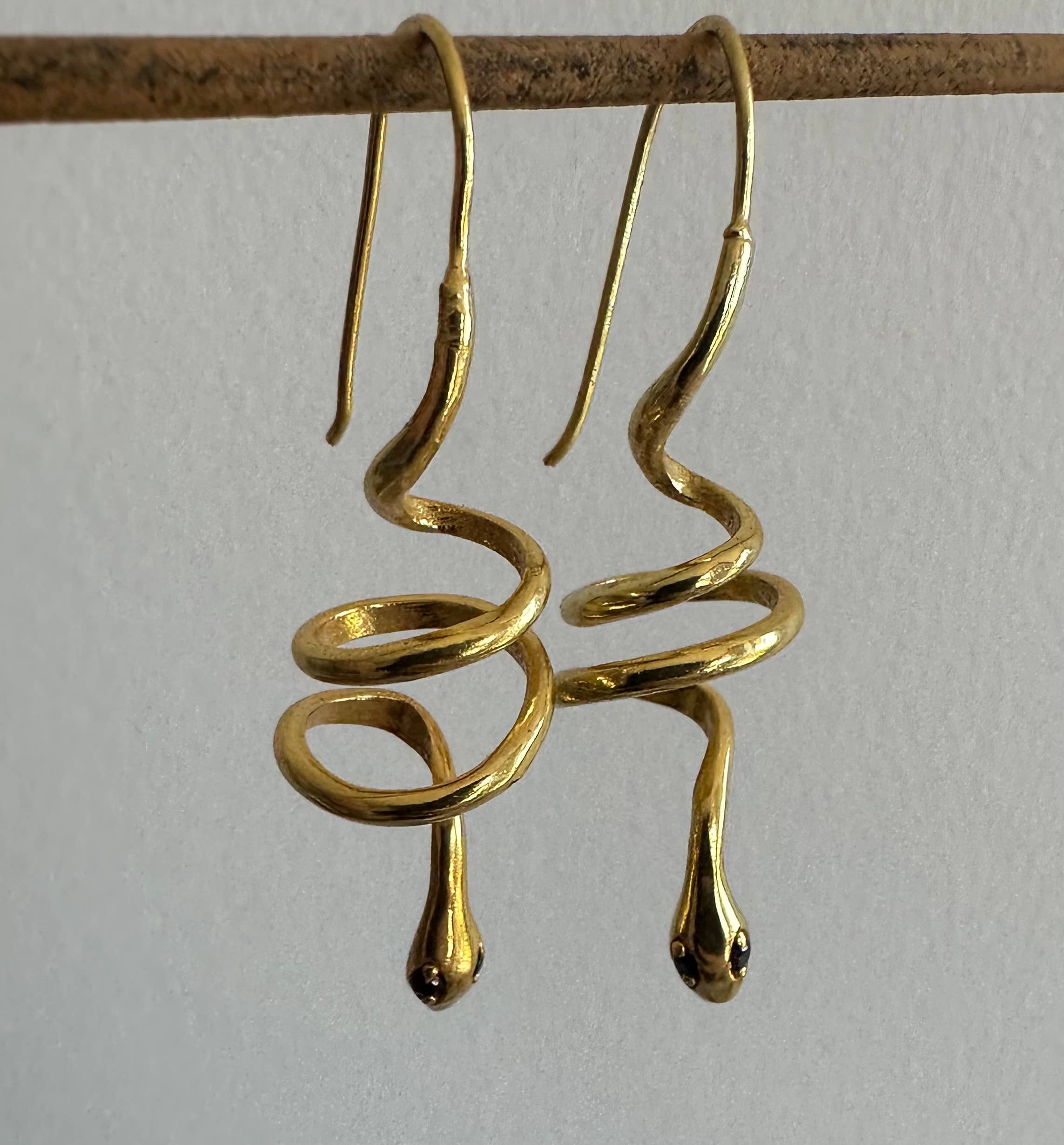 Black Zircon Eyes | Gold Snake Hoop Earrings
