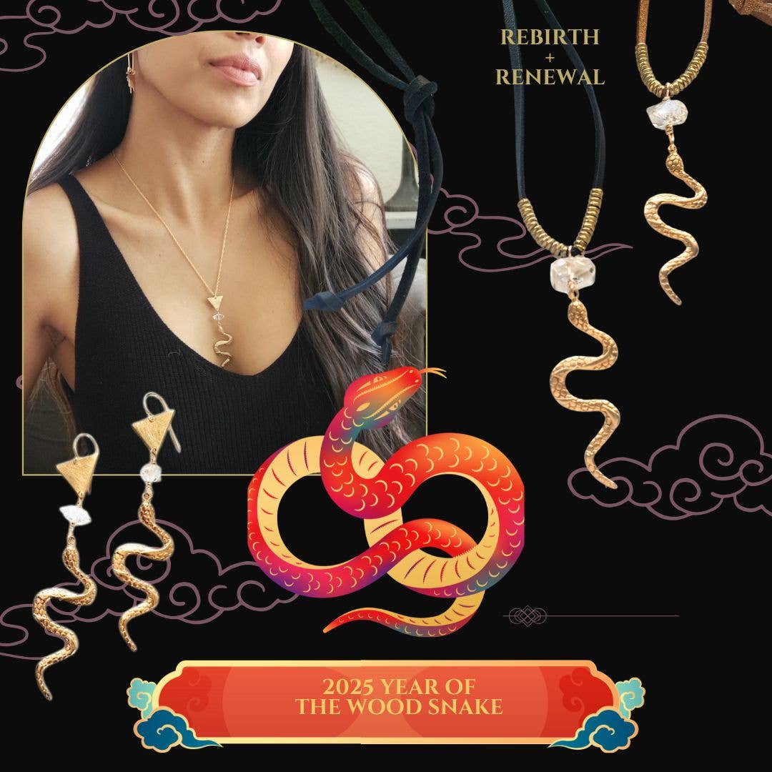 A woman wears a gold snake-shaped necklace with a clear crystal. Illustrated red and gold snake, clouds, and text: REBIRTH + RENEWAL and 2025 YEAR OF THE WOOD SNAKE are shown on black, alongside Dreamers of Dreams Gold Year of the Snake Earrings.