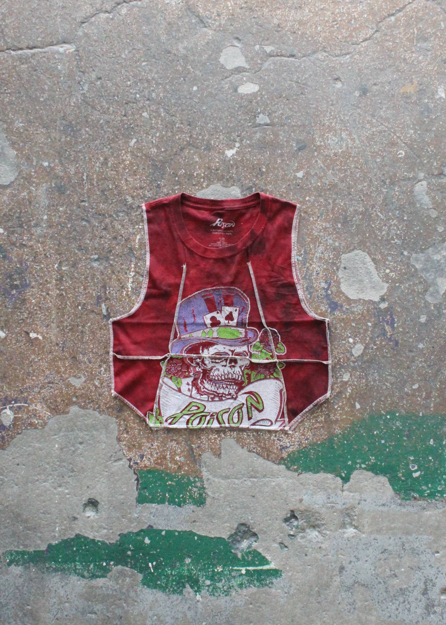 Overlock Cropped Music Muscle Tee in red with skull graphic and artistic overlock stitching for edgy casual wear