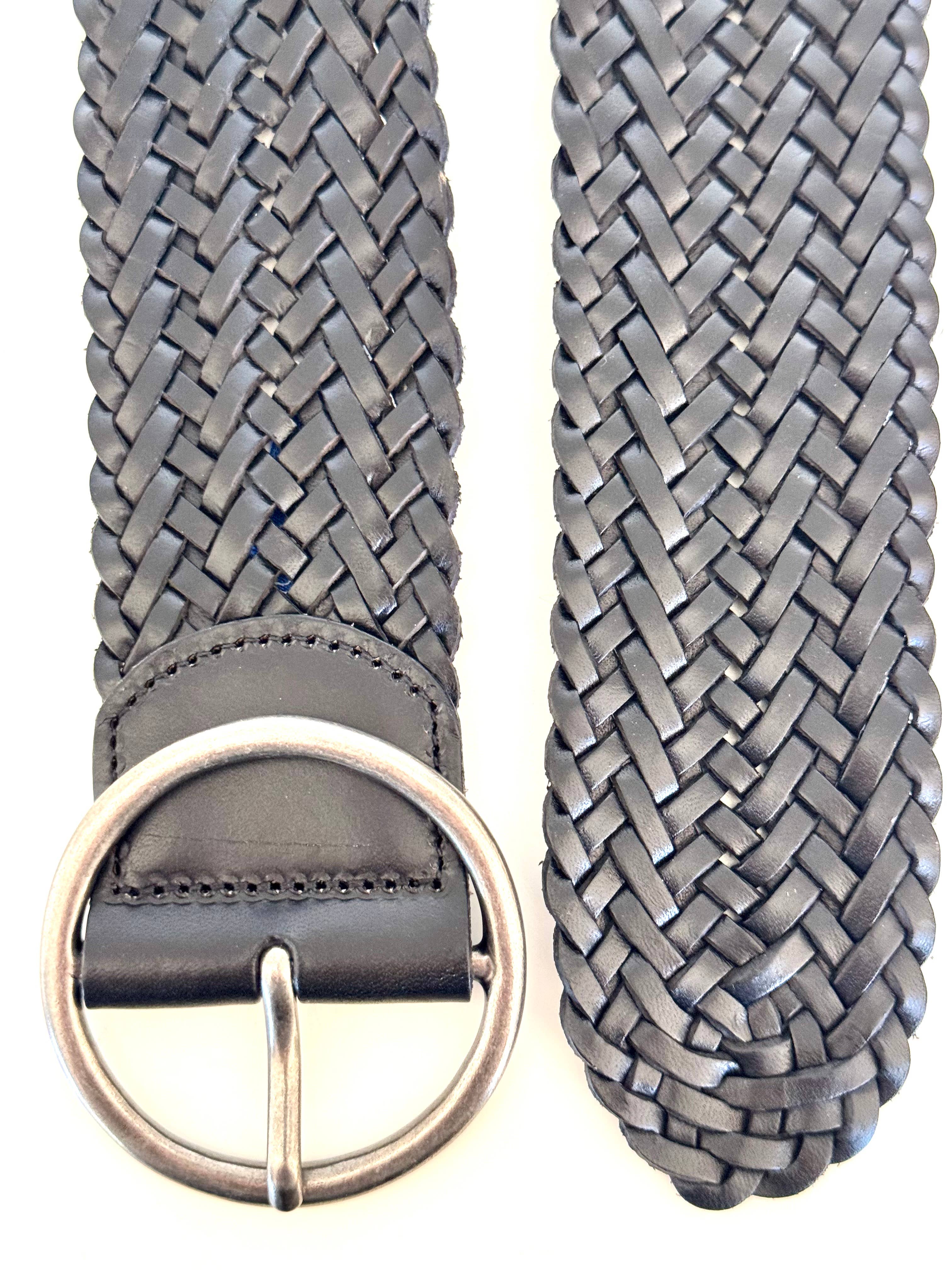Close-up of the Ginger Blue Classic Wide Braided Leather Belt in Black, featuring an intricate weave and vintage silver buckle, displayed against a white background.