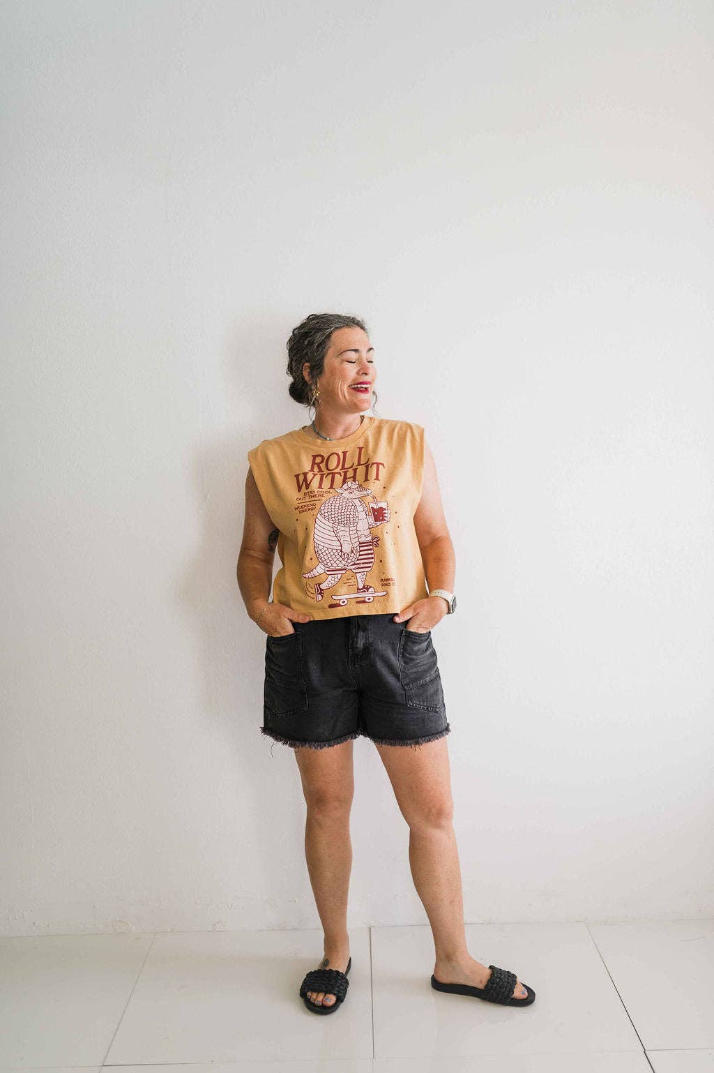 Roll with it armadillo | faded mustard boxy muscle tee