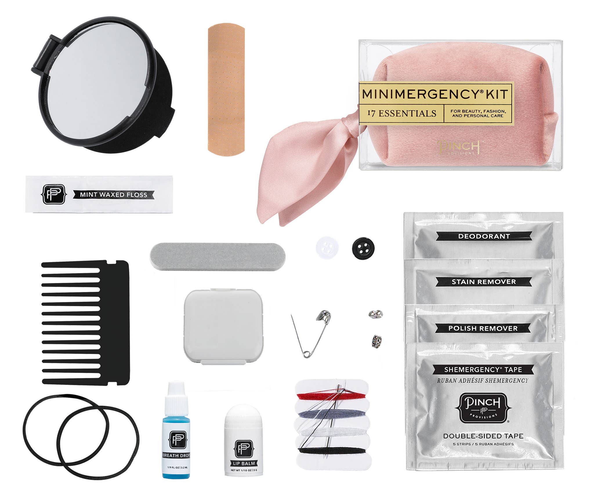 Velvet Scarf Minimergency Kit with mirror, floss, comb, lip balm, bandage, pins, tape, and stain removers neatly arranged on white background
