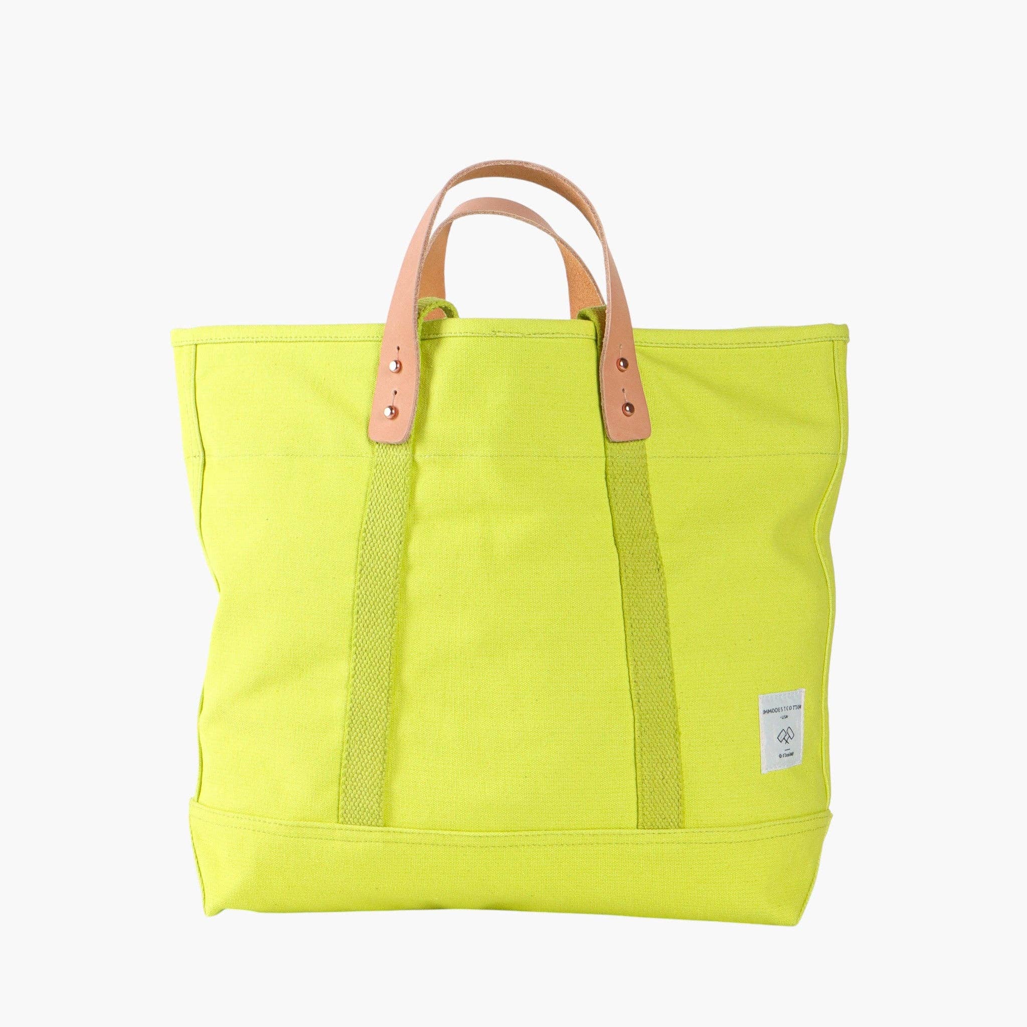 Small East West Tote | Lime with sturdy leather handles and durable canvas in a vibrant lime color for everyday use