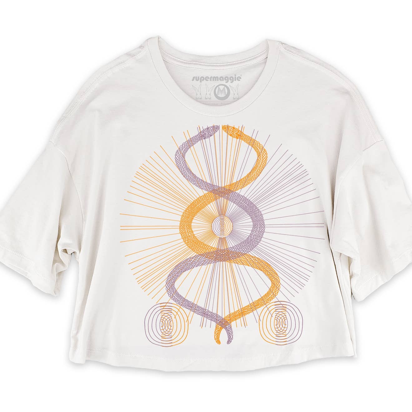 The Sunshine Snakes Clover Crop Tee by Supermaggie @ Faire is a white, hand-printed Austin TX tee featuring yellow and purple geometric spirals, radiating lines, and small circles.