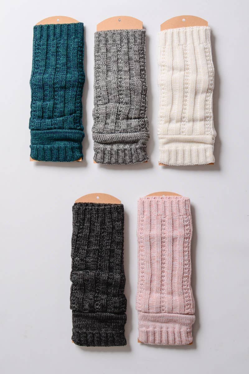 Five pairs of cozy Leto Accessories leg warmers in teal, gray, cream, black, and pale pink are displayed flat with cardboard hangers. Perfect for pairing with Ribbed Arm Warmers for a stylish layered look.