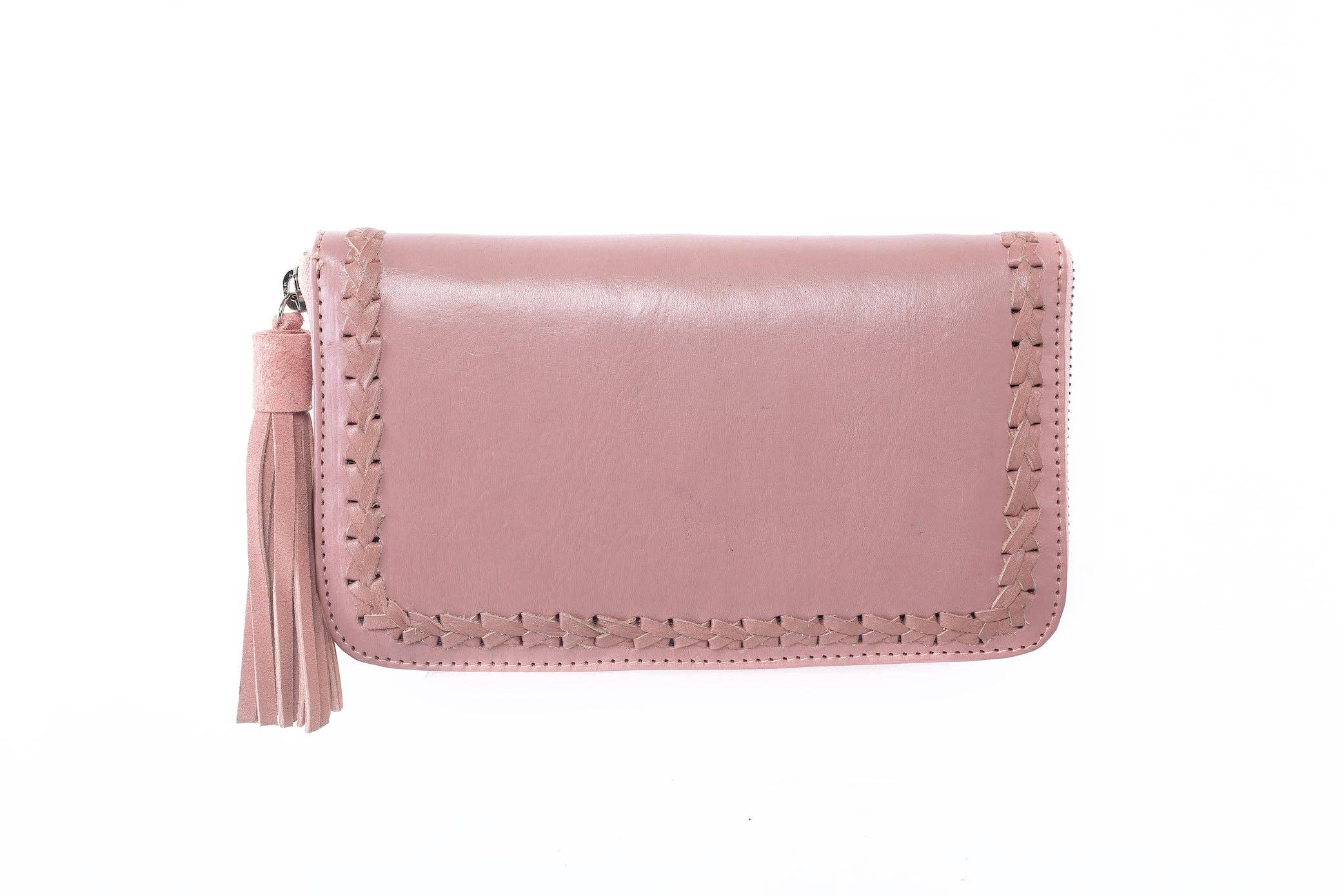 The Jodi Lee Wild Waratah Wallet Pink, featuring decorative stitching and a matching tassel zipper pull, is showcased against a white background.
