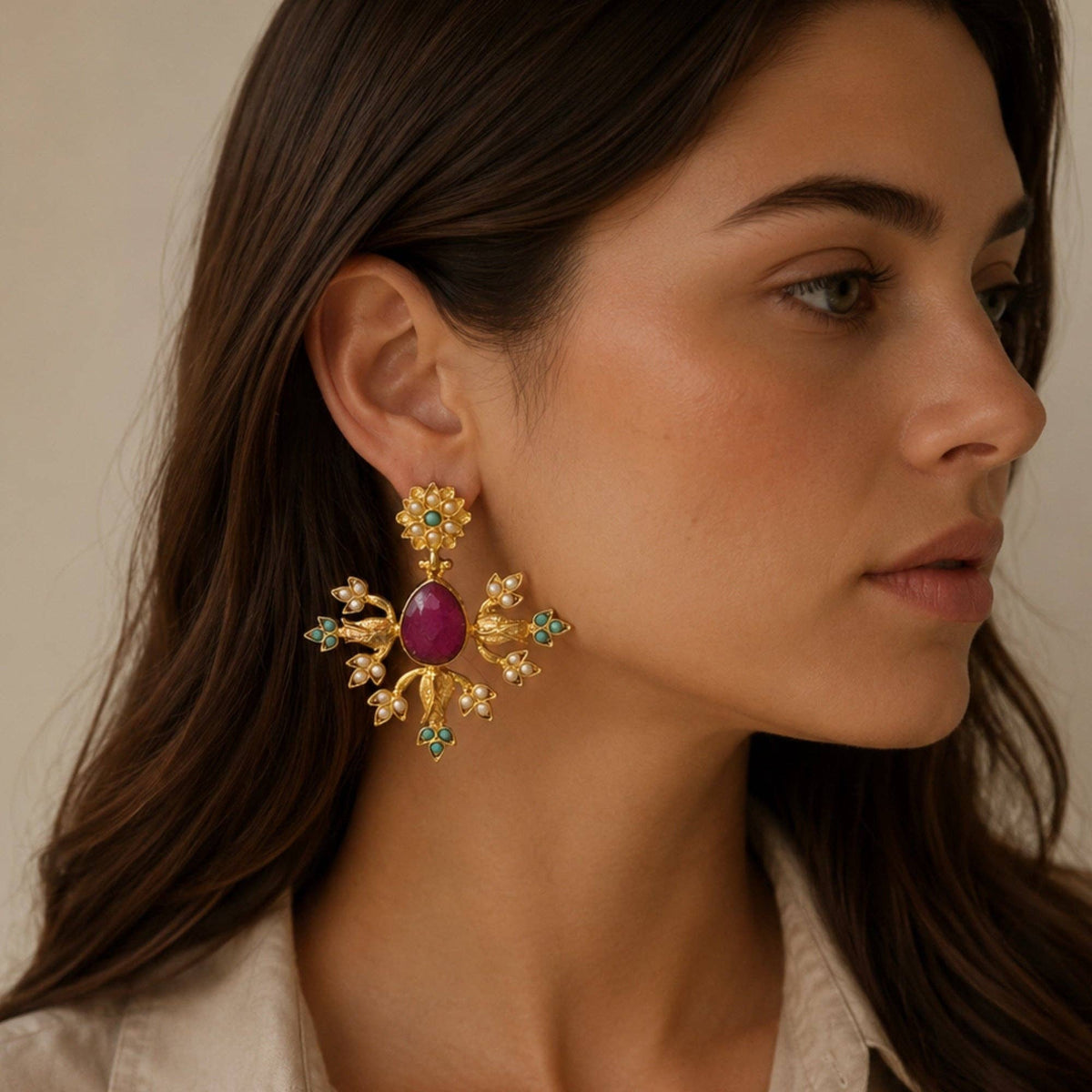 Sevil Ruby Pearl and Turquoise Motif Earrings worn as artisan statement jewelry with gold floral details