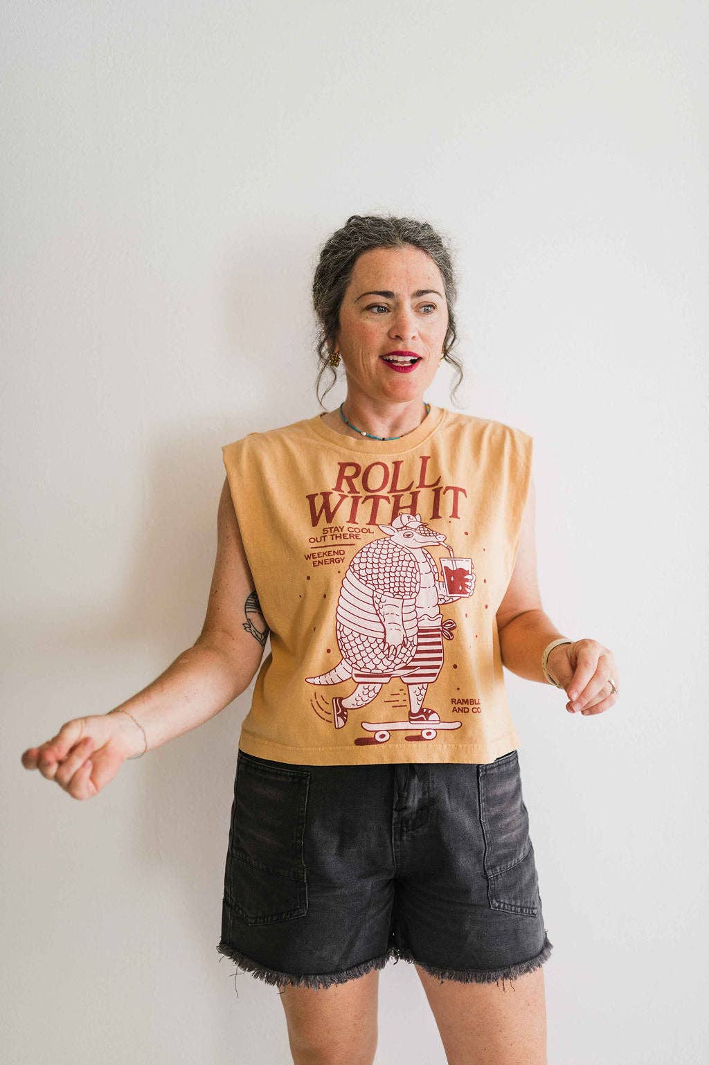 Roll with it armadillo | faded mustard boxy muscle tee