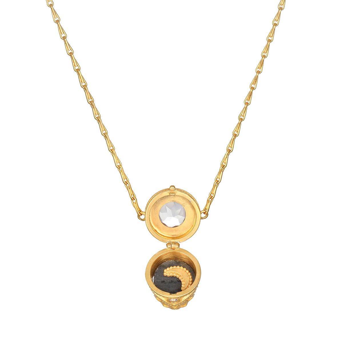 The Satya Jewelry "Guiding Spirit Labradorite Feather Locket Necklace - 18"" features a gold round locket with a black and gold spiral inside and a clear labradorite gemstone set in the lid, making it a unique spiritual talisman accessory.