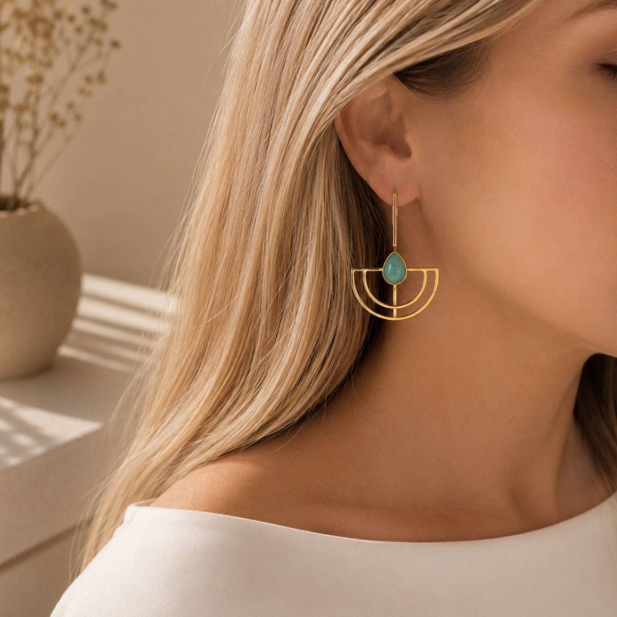 Karpuz Aqua Chalcedony Earrings with gold geometric drops styled on ear