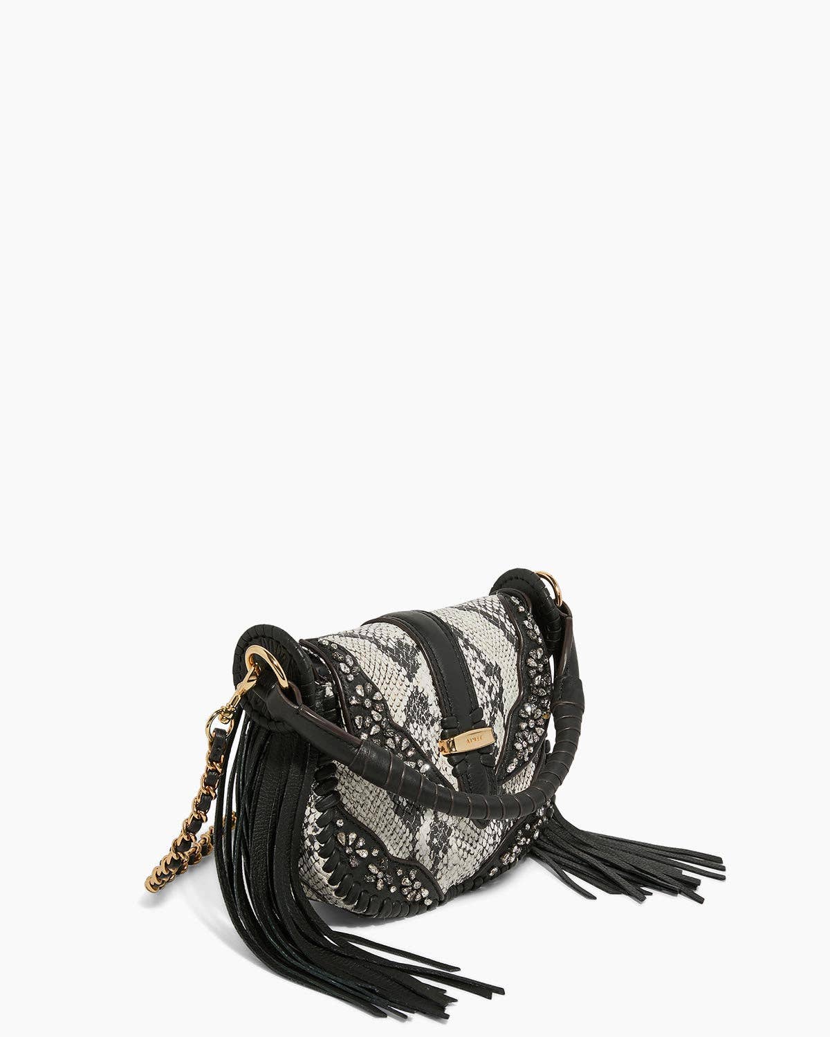 Willow Novelty Mini Crossbody with black fringe, snakeskin pattern, and gold chain strap detail on white background