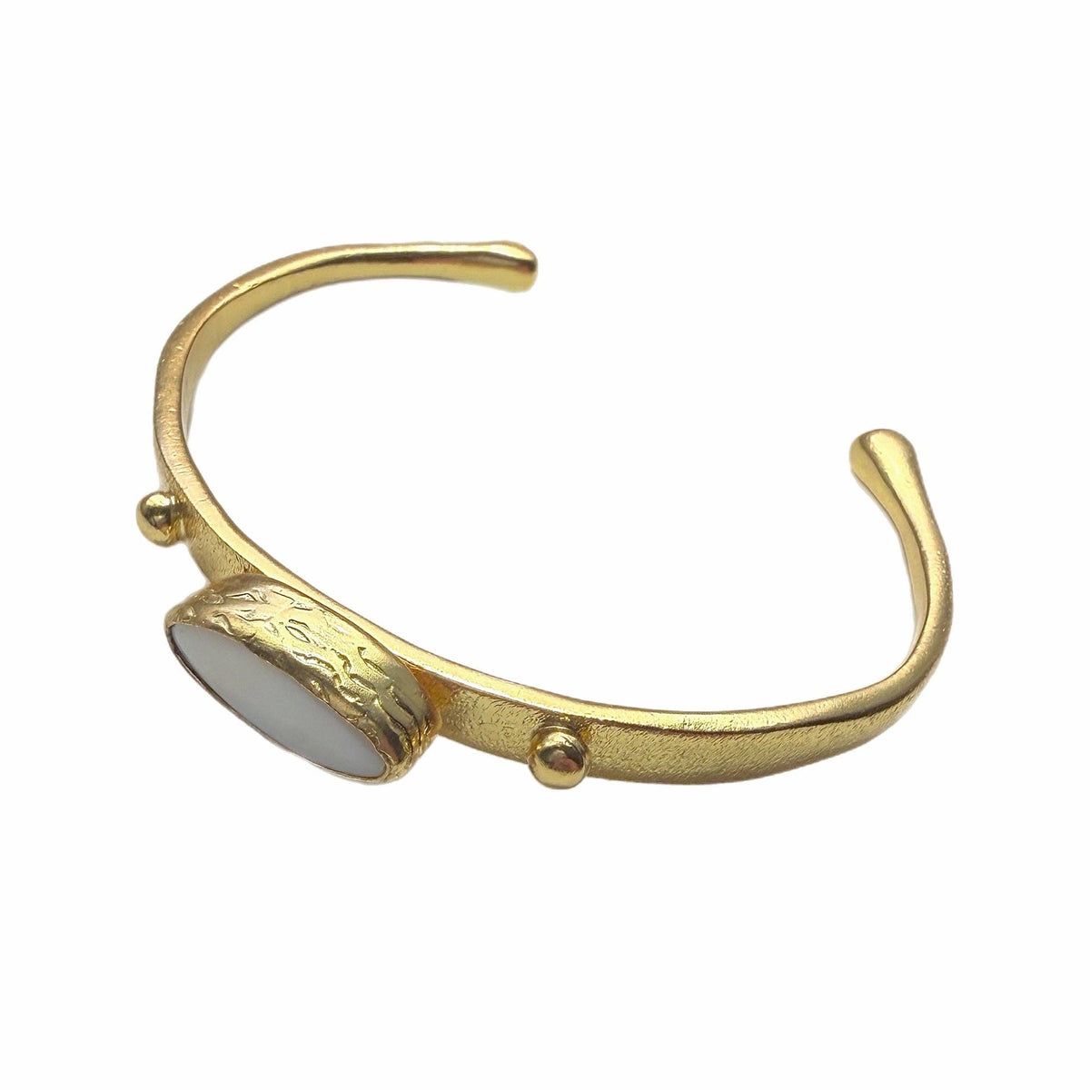 Zeynab Mother of Pearl Cuff Bracelet with gold tone finish and oval mother of pearl accent