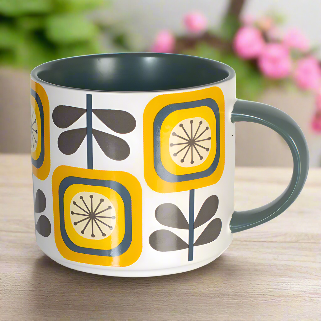 Sunflower Fall Mid Century Modern Stackable Matte Coffee Mug with retro floral pattern and grey handle on wooden surface