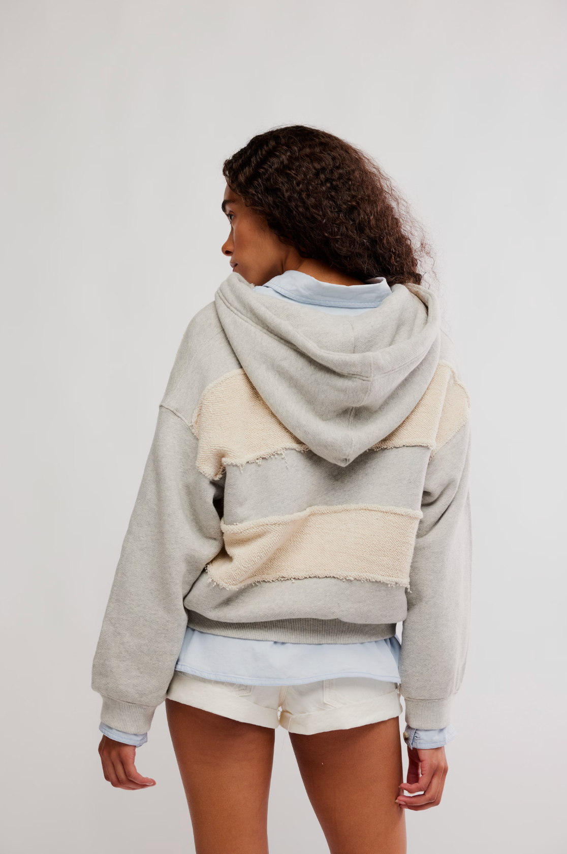Relaxed fit Camp Crush Hoodie with textured fabric stripes, soft gray color, and oversized hood styled casually on model.