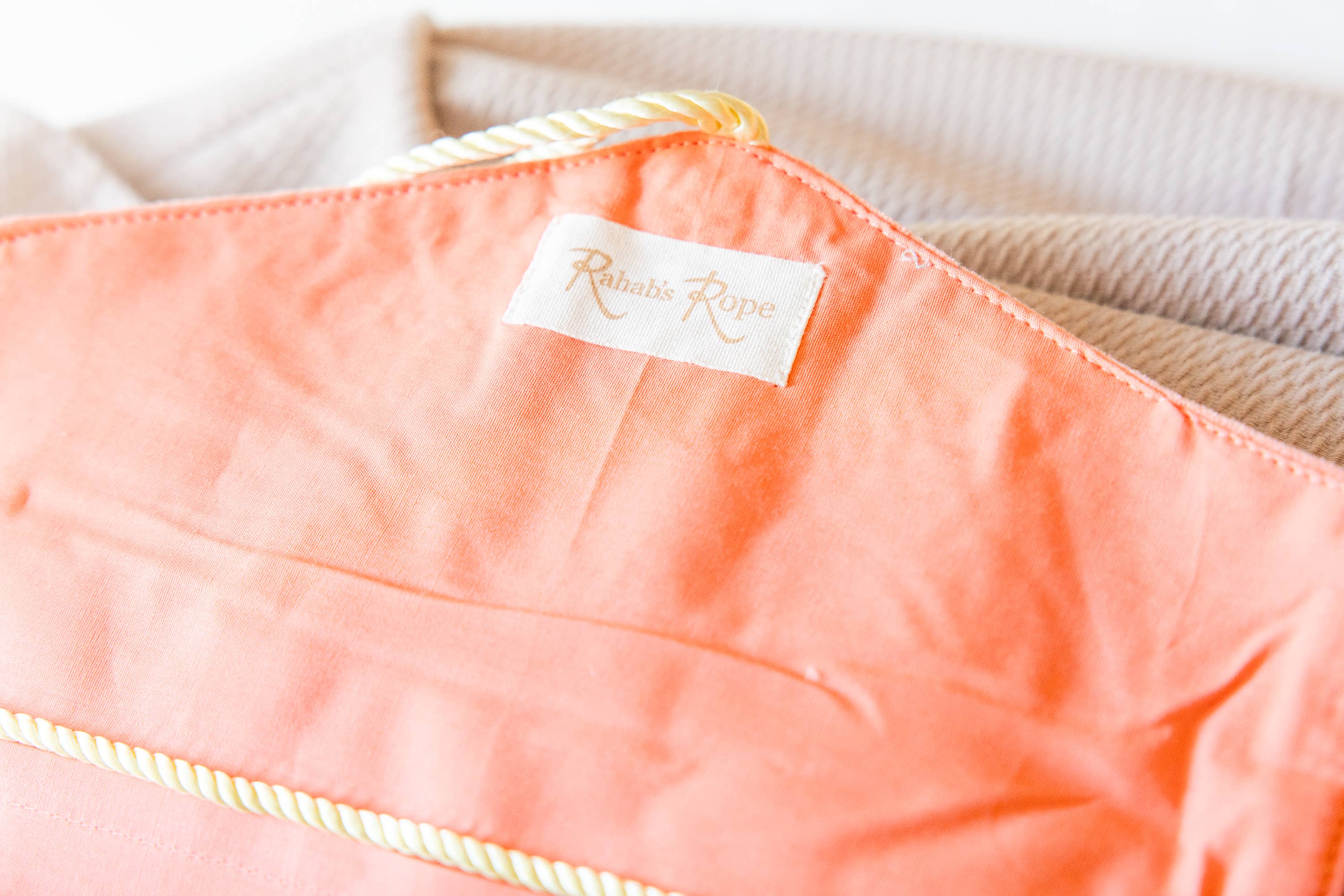 Embroidered Velvet Jewelry Organizer-Coral with soft coral velvet fabric and gold trim detailing for elegant jewelry storage.
