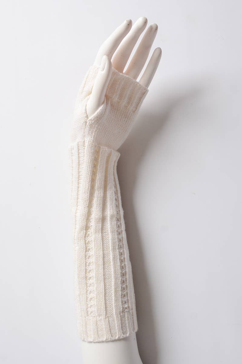 A white mannequin hand displays Leto Accessories' Ribbed Arm Warmers—cozy, off-white, fingerless knit gloves—against a plain white background.