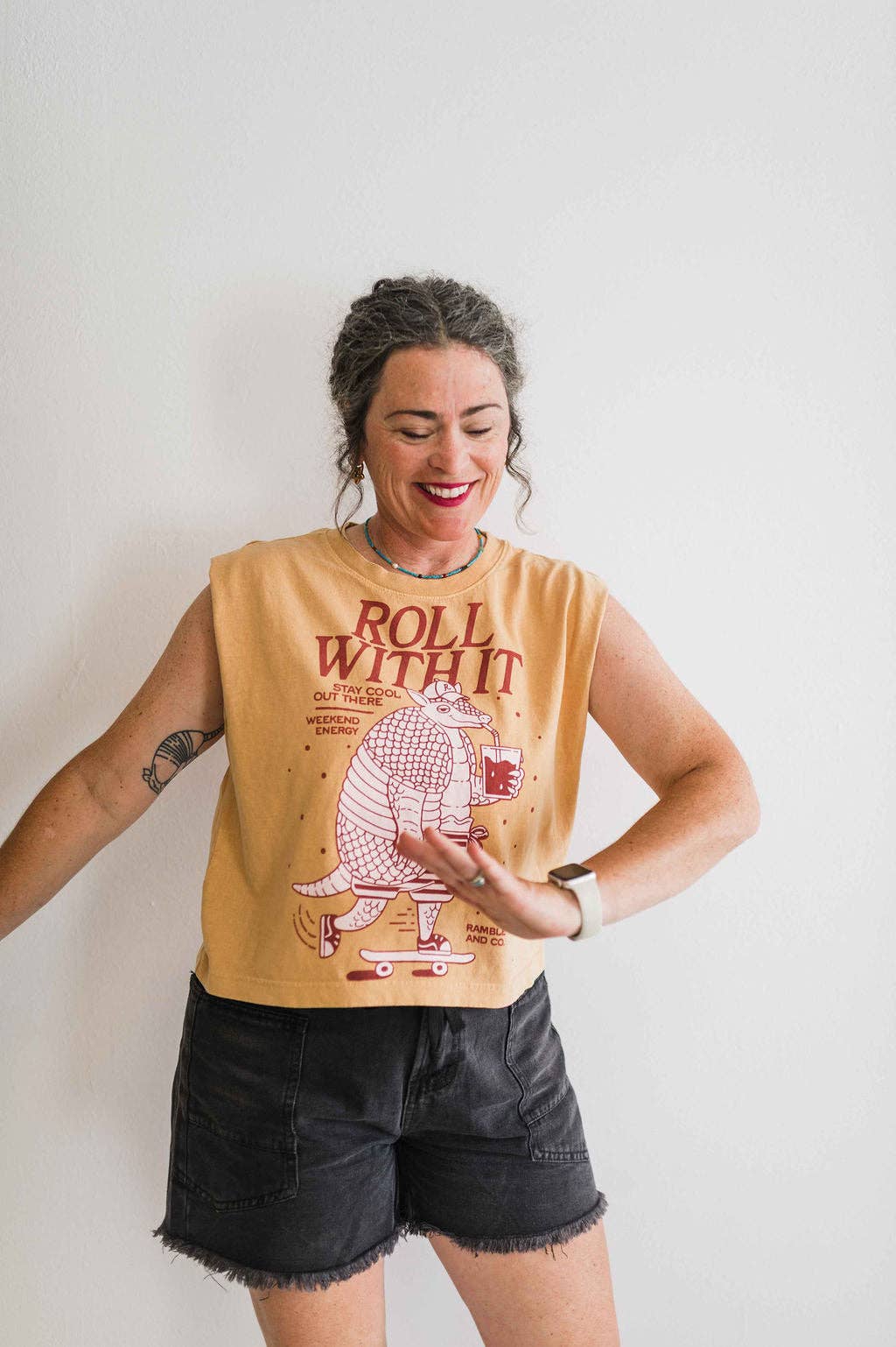Roll with it armadillo | faded mustard boxy muscle tee