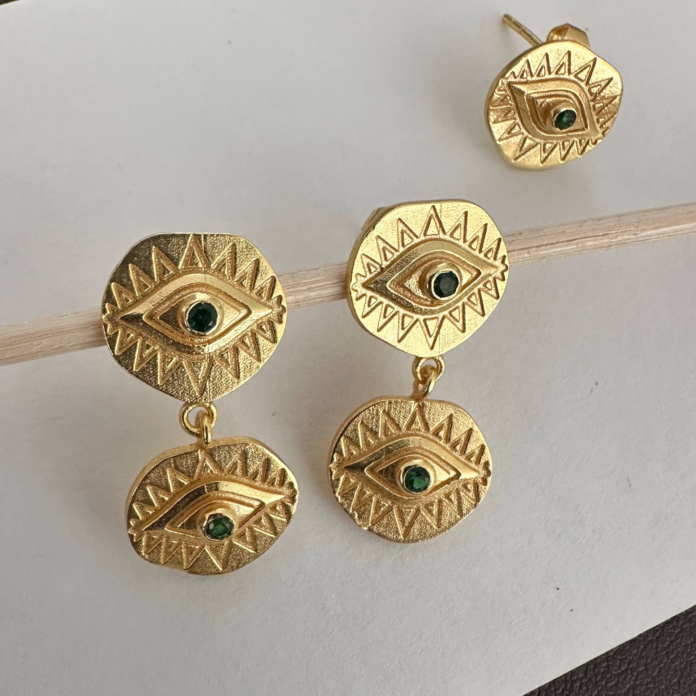 Gold textured artisan earrings with green stone accents in bold eye shapes Third Eye | Evil Eye Earrings
