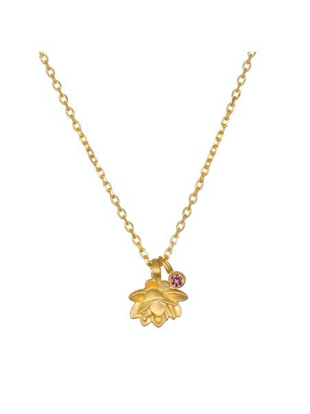 The Satya Jewelry Lotus Pink Tourmaline Neck with 3'' Extension Chain showcases a delicate lotus pendant and pink tourmaline charm, elegantly presented against a plain white background.