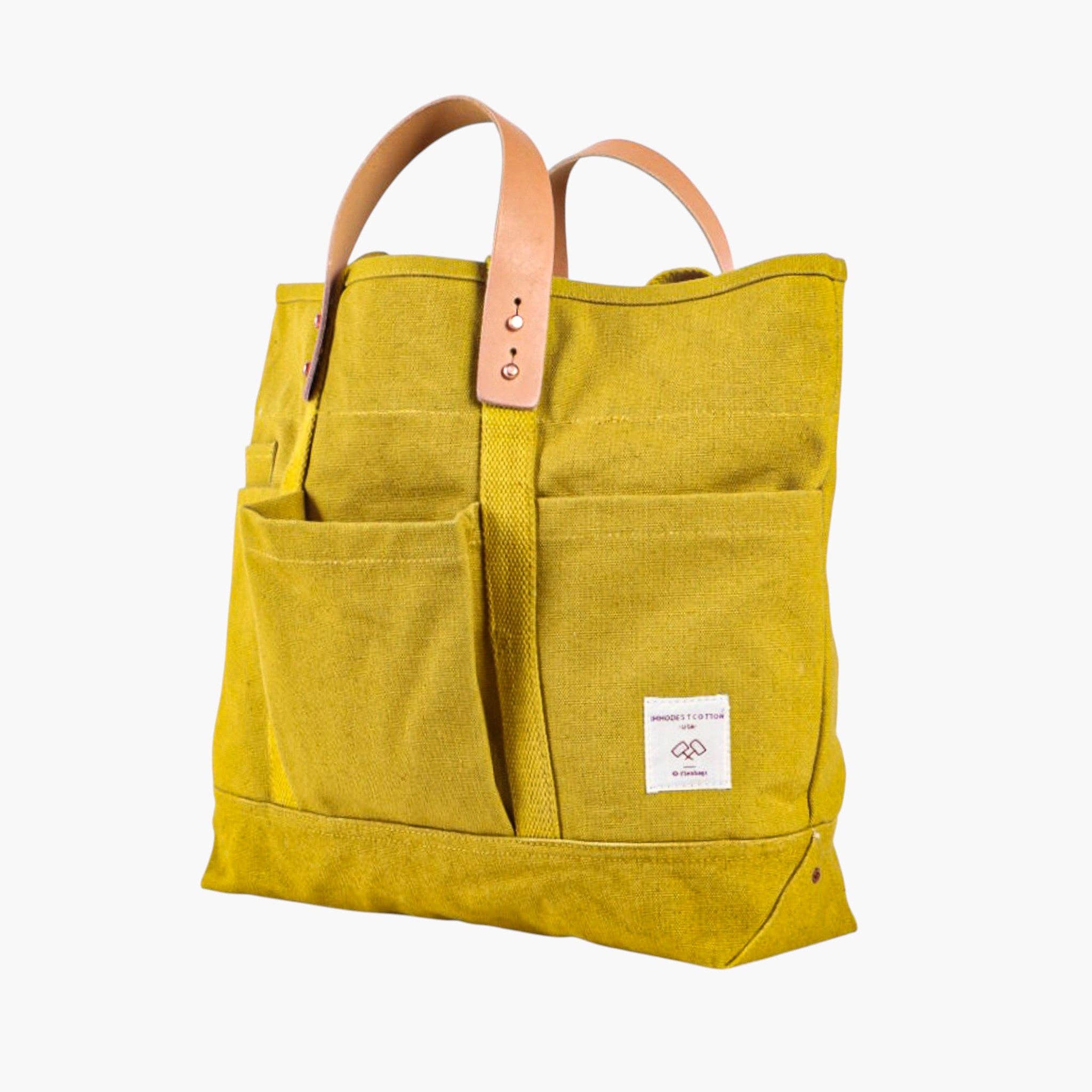 Construction Tote | Chartreuse with multiple exterior pockets and sturdy leather handles for durable everyday use