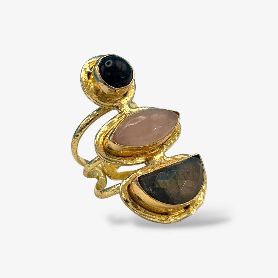 Elegant Cocktail Rings featuring gold-toned settings with black, rose, and labradorite stones, perfect statement pieces.