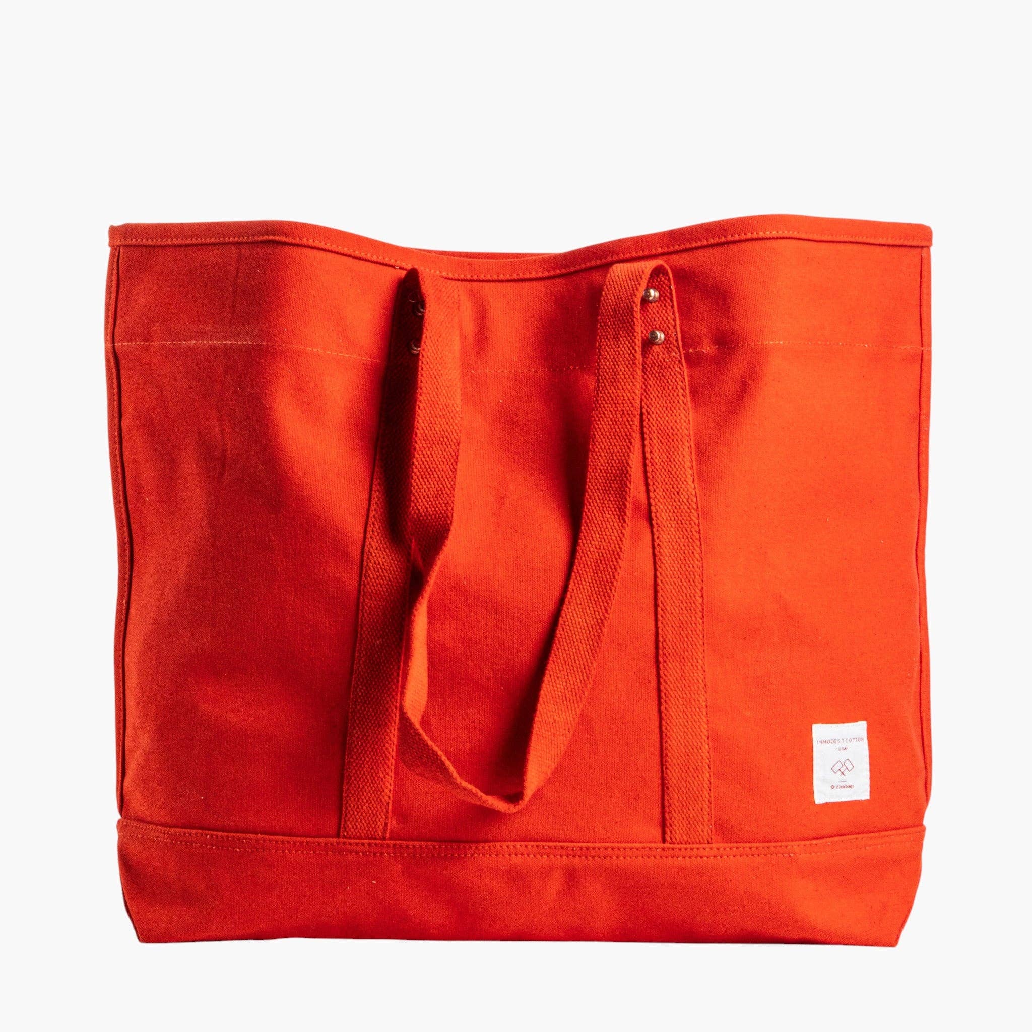 Large East West Tote | Persimmon in vibrant orange canvas with sturdy handles for everyday stylish use