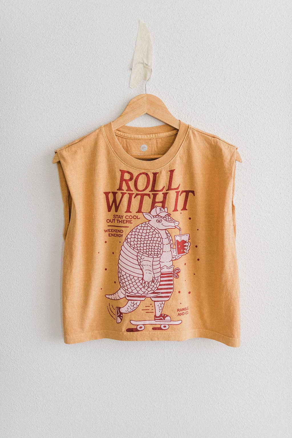Roll with it armadillo | faded mustard boxy muscle tee