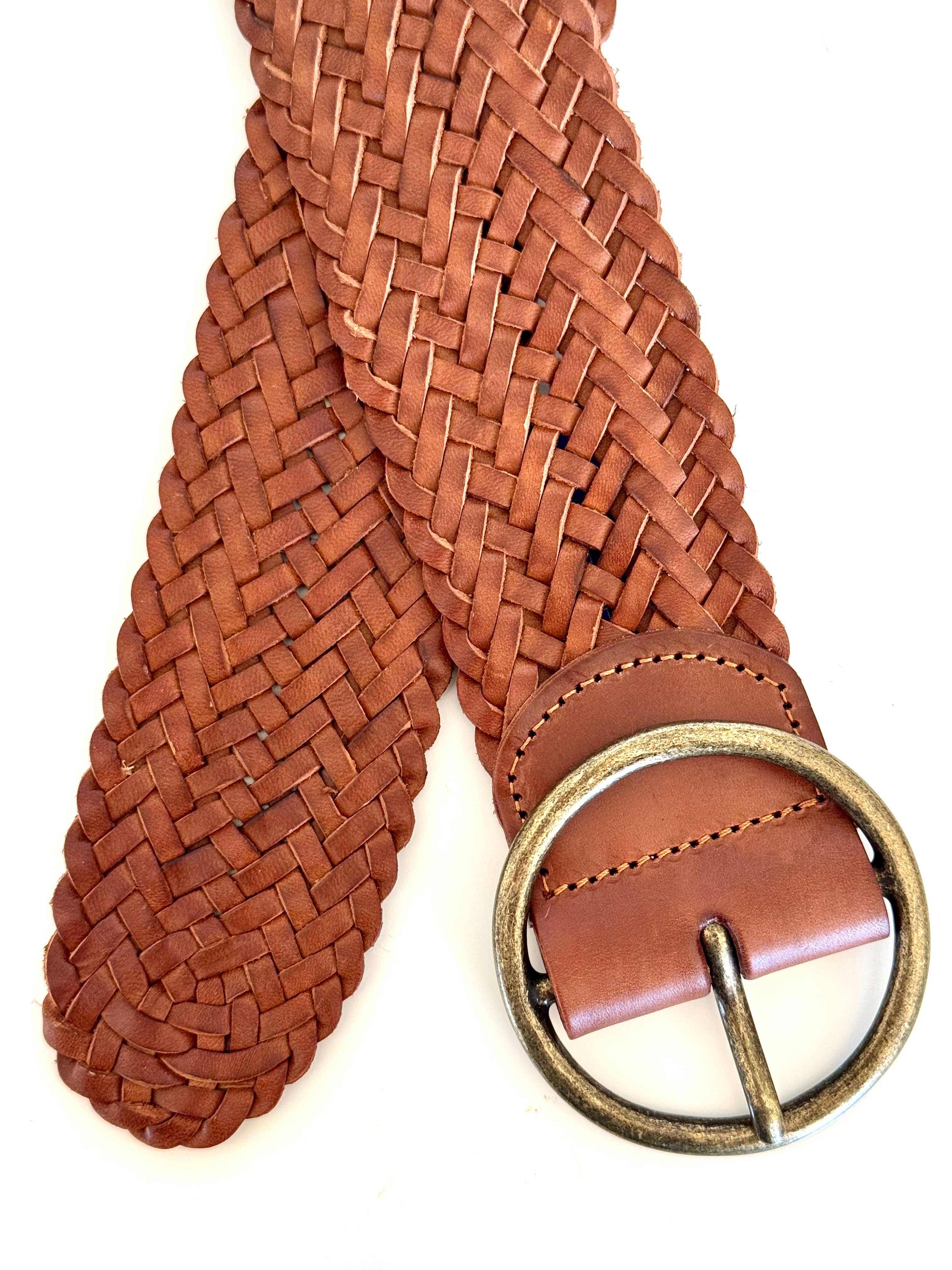 A close-up of the Ginger Blue Classic Wide Braided Leather Belt in Cognac, featuring a vintage silver buckle, displayed on a white background.