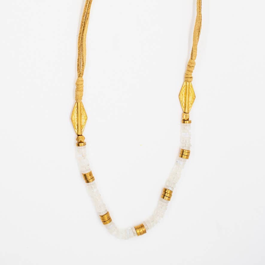 Stone & Leather Necklace with white beads and gold accents on a soft tan leather cord in a boho style design