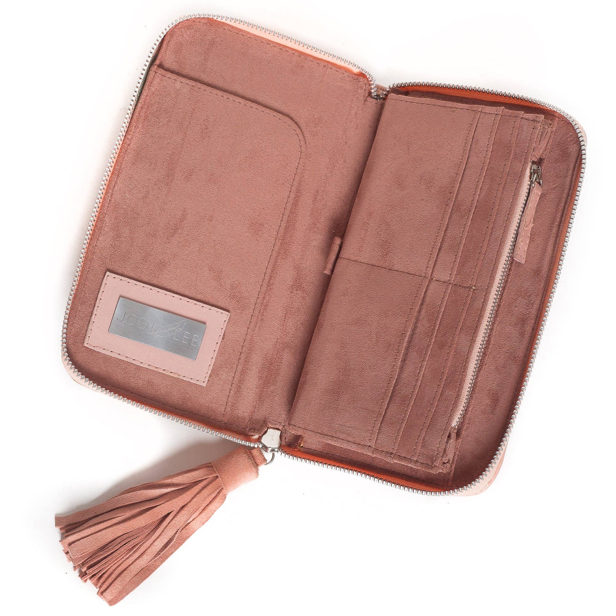 The Jodi Lee Queen Hummingbird Wallet Blush is a blush pink suede zippered wallet with card slots, a zip pocket, ID window, large tassel on the zipper, and a soft velvety interior.