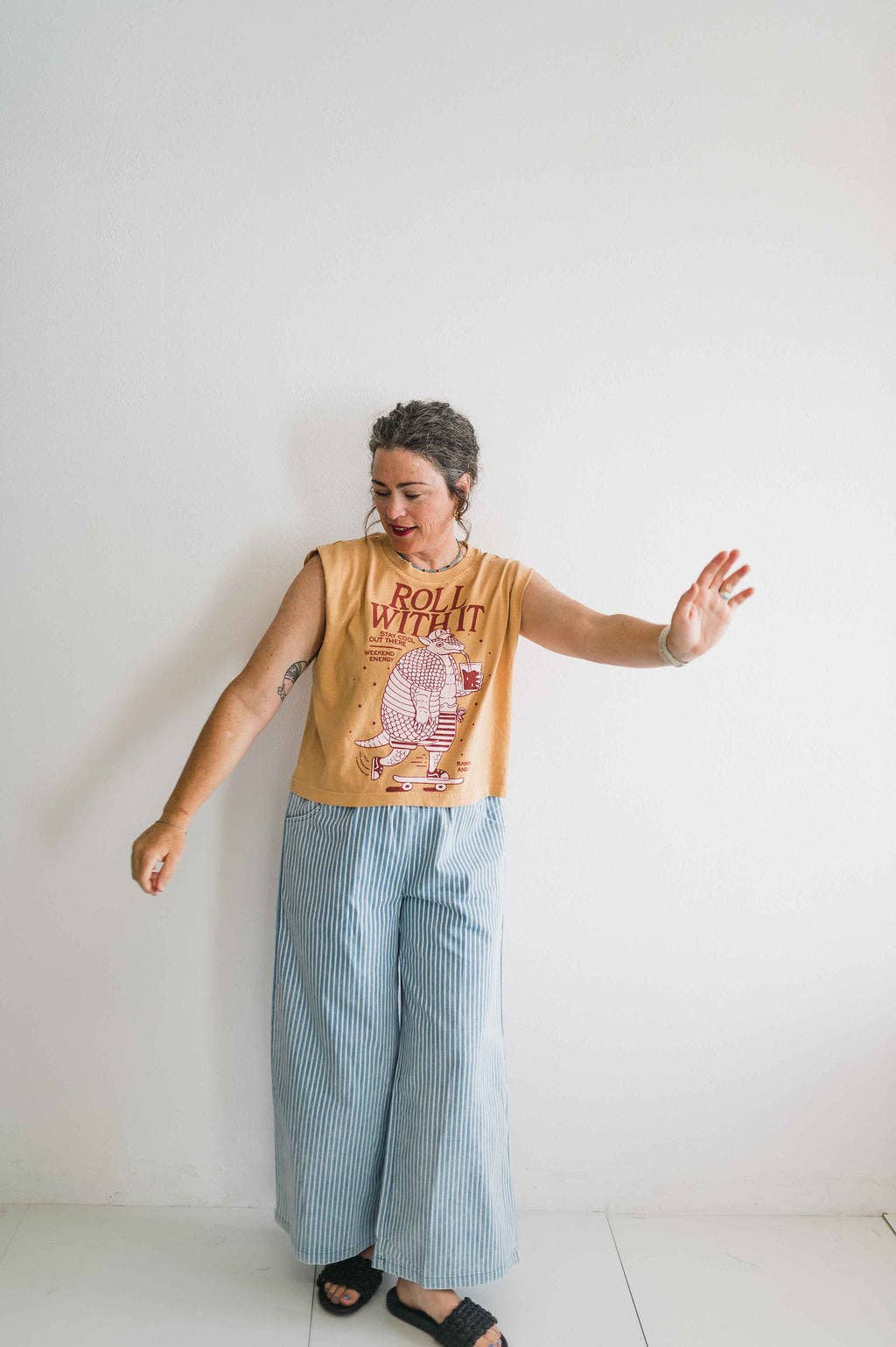 Roll with it armadillo | faded mustard boxy muscle tee