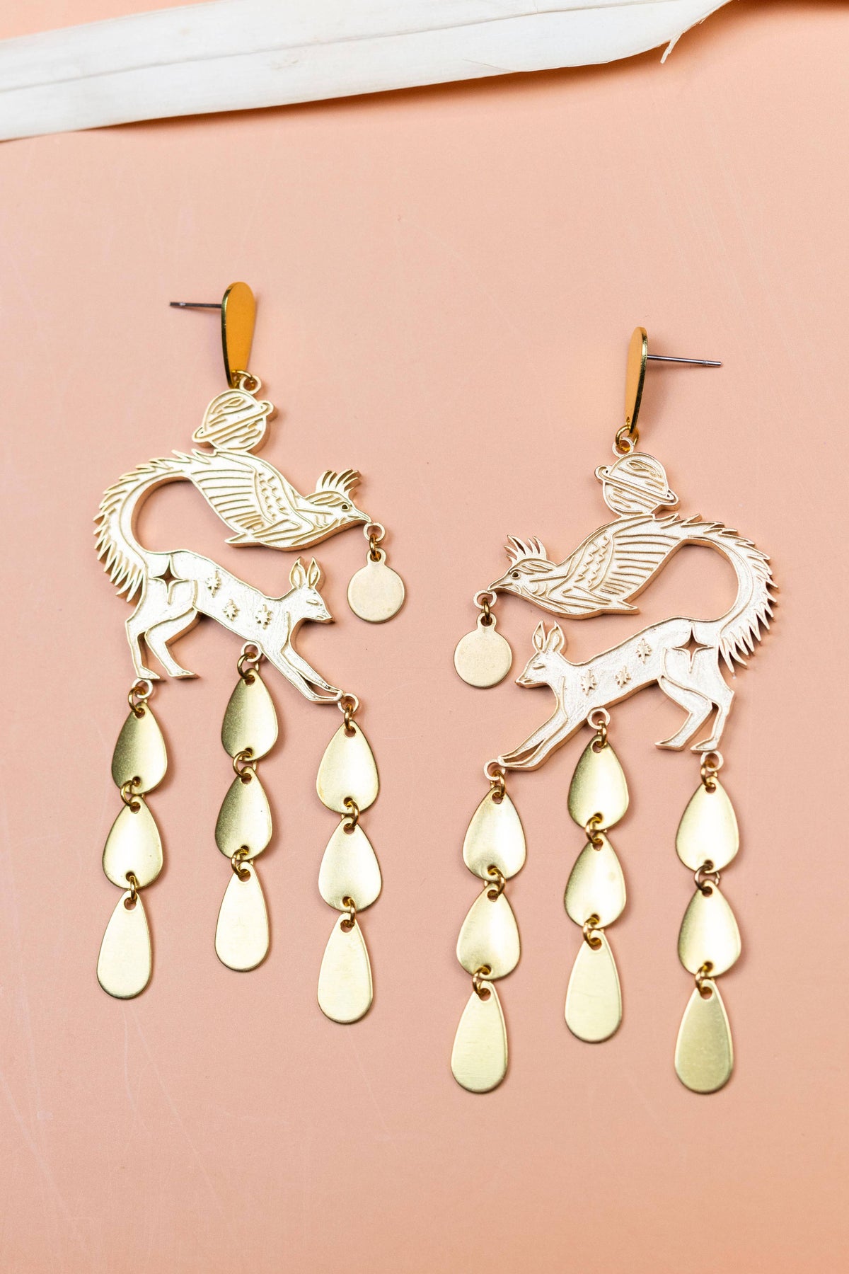 Quilinx gold tone winged horse drop earrings with teardrop charms