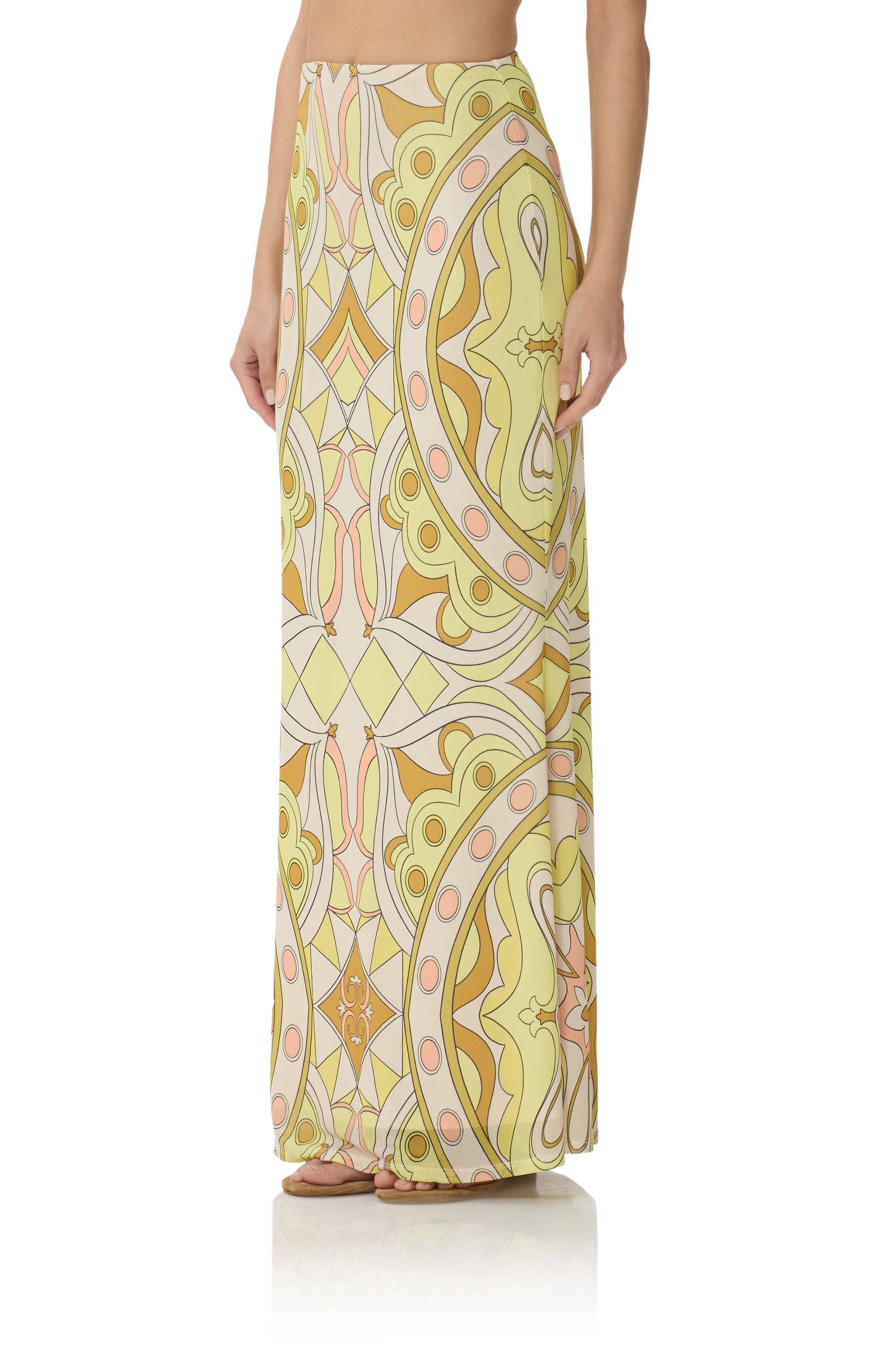 Tegan Skirt - Geo Scarf with soft, colorful bohemian graphics in pastel yellow, peach, and beige tones, flowing maxi length.