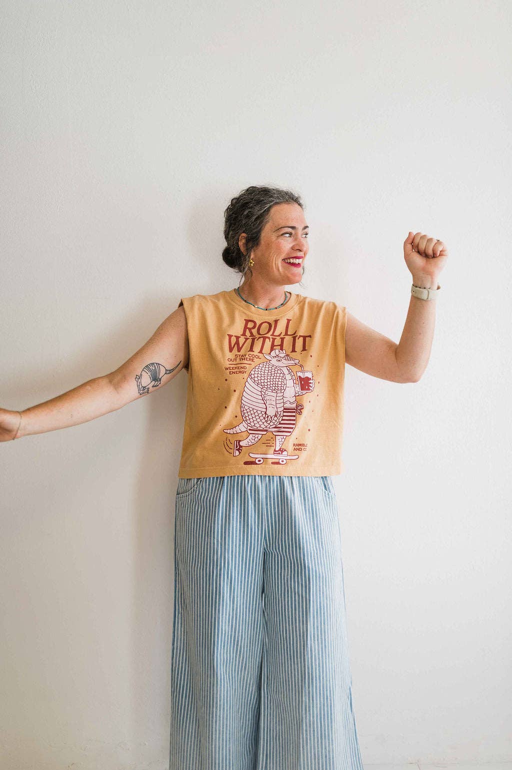 Roll with it armadillo | faded mustard boxy muscle tee