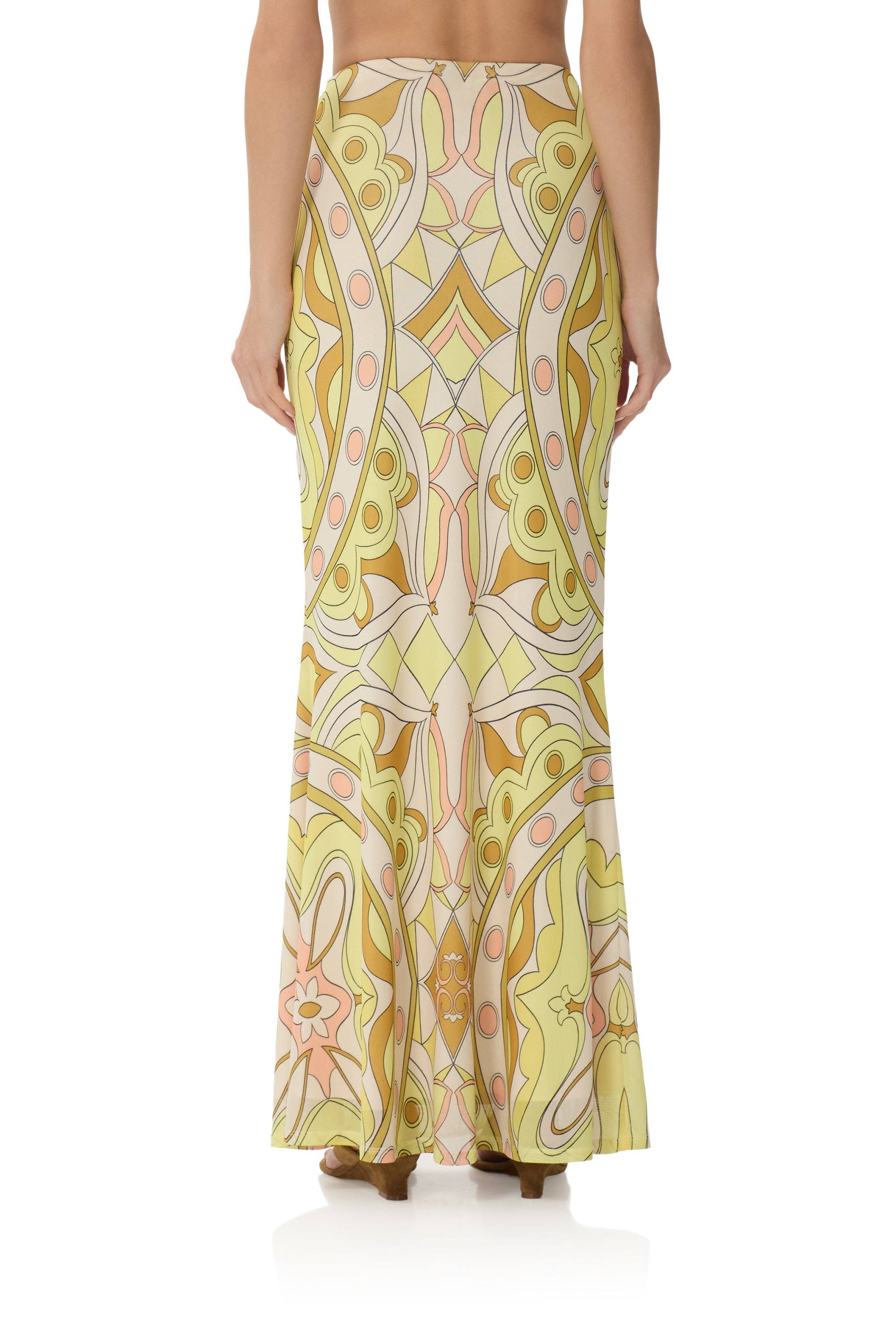 Tegan Skirt - Geo Scarf featuring a vibrant geometric pattern in soft yellow, peach, and beige tones.