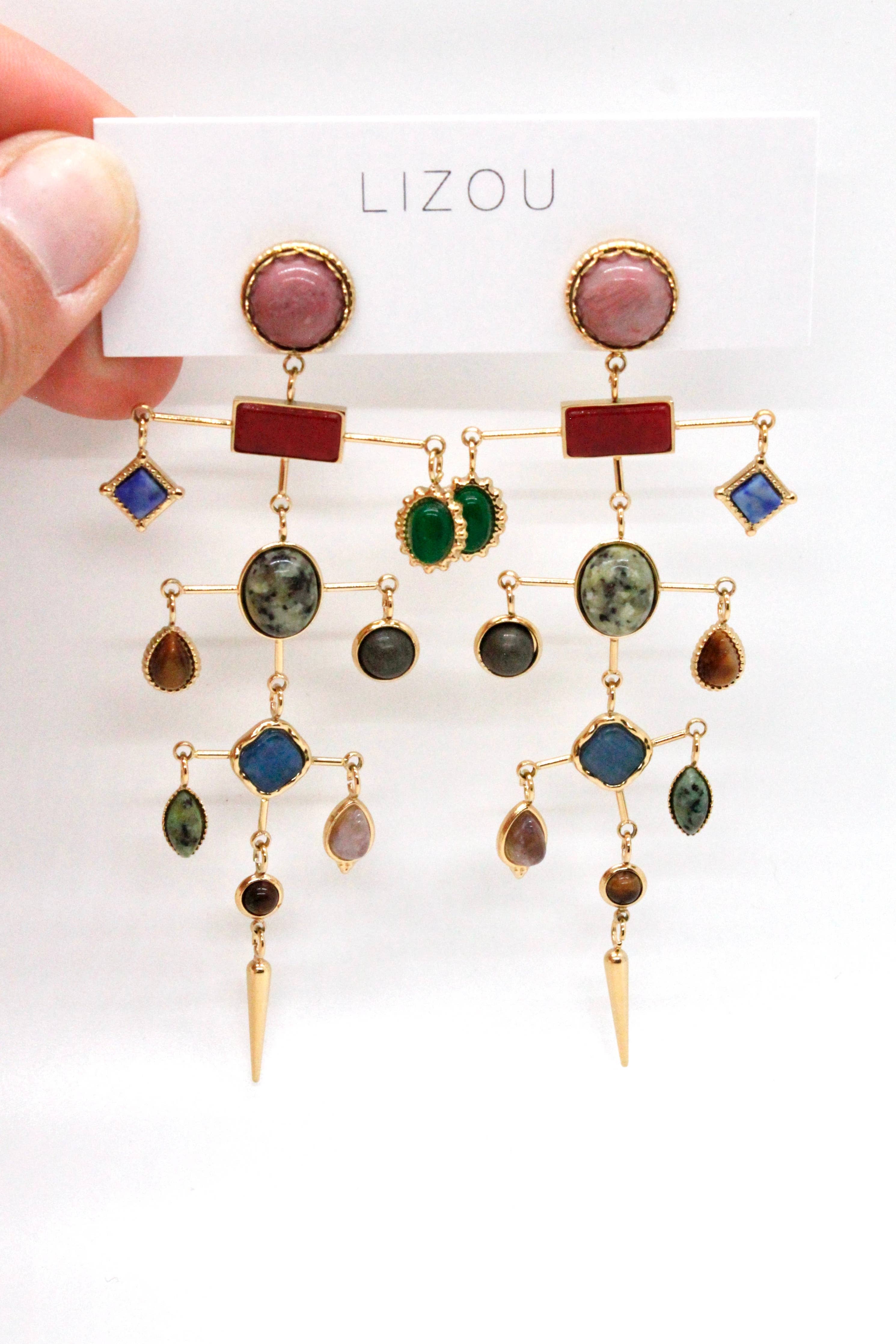 Museum Style Artsy Semi Precious Stone Mobile Earrings with colorful stones and intricate gold detailing held on a white card