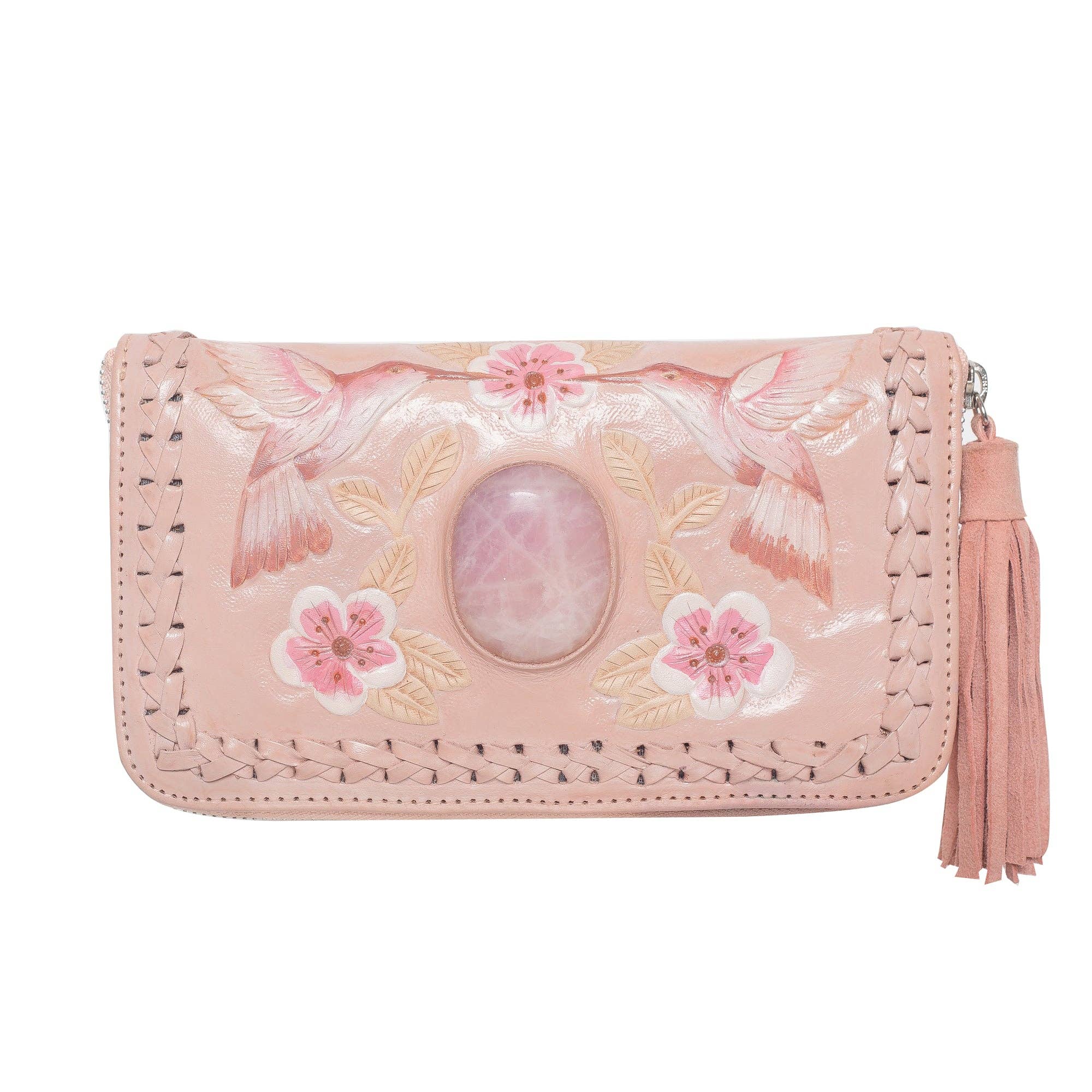 The Jodi Lee Queen Hummingbird Wallet Blush features a light pink bohemian design with a central oval gemstone, embossed and hand-painted hummingbirds, pink flowers, braided edges, and a tassel zipper pull.