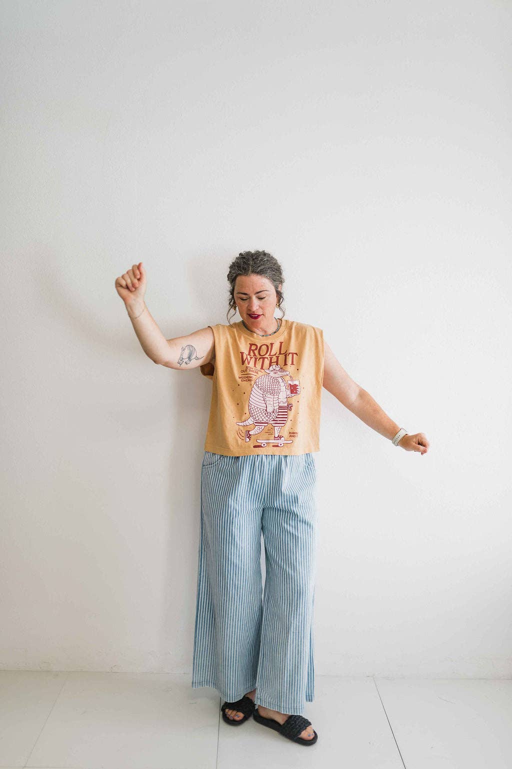 Roll with it armadillo | faded mustard boxy muscle tee