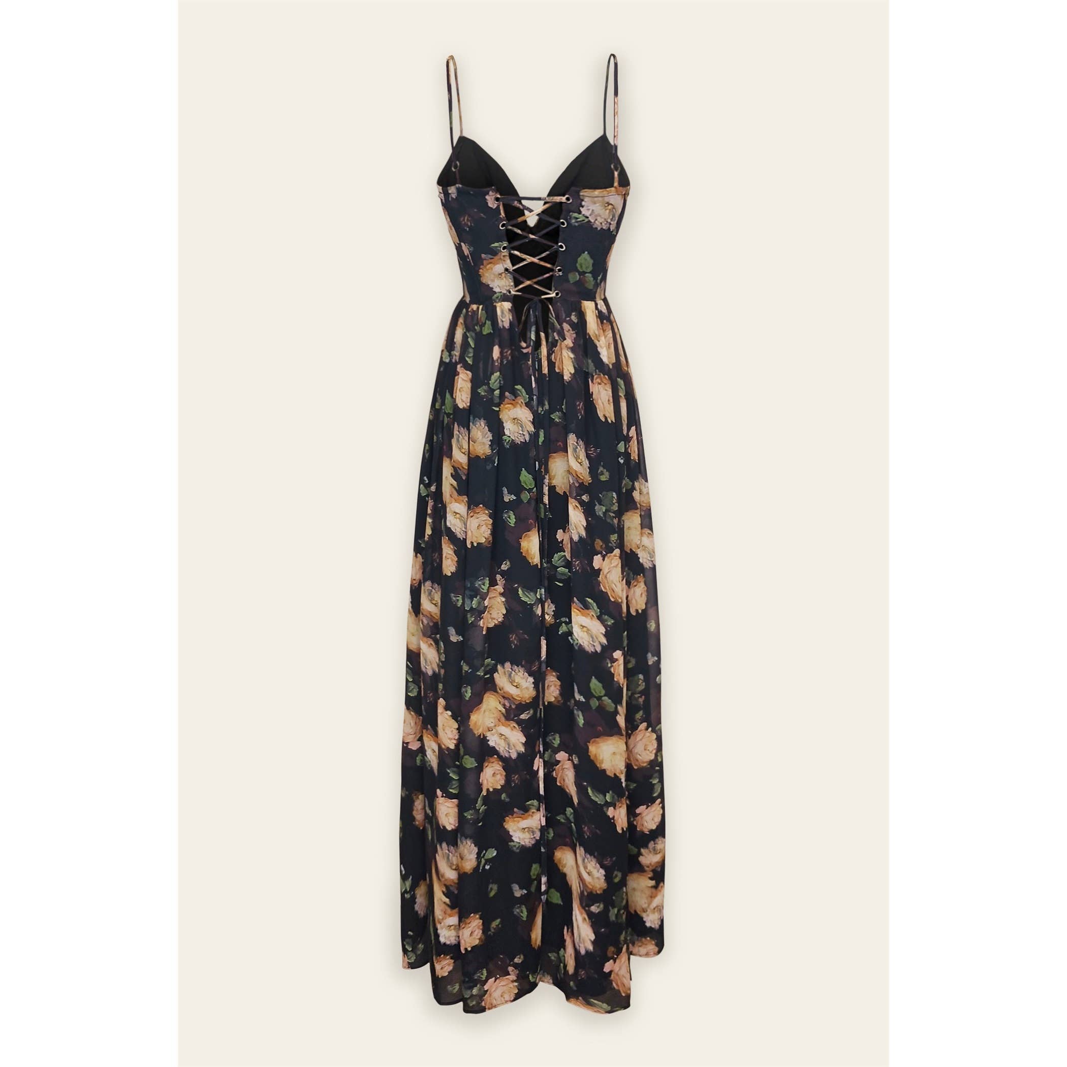 The Opaline Shadow Corset Maxi Dress by Dress Forum is a sleeveless, floor-length chiffon gown with thin straps, a V-neckline, crisscross lace-up corset bodice, and a flowy skirt featuring peach and green floral prints.