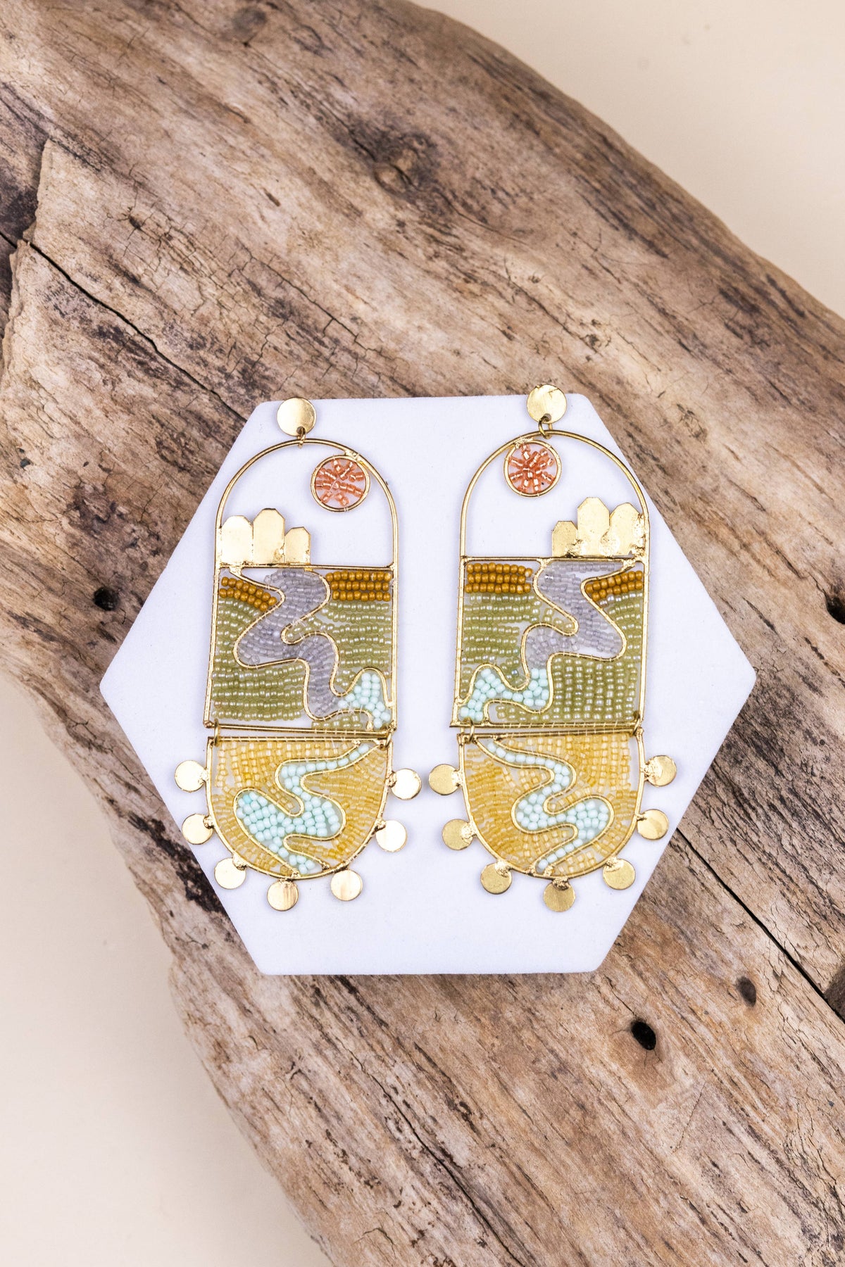 The River Flows Yonder handcrafted gold beaded earrings with colorful abstract designs and dangling accents