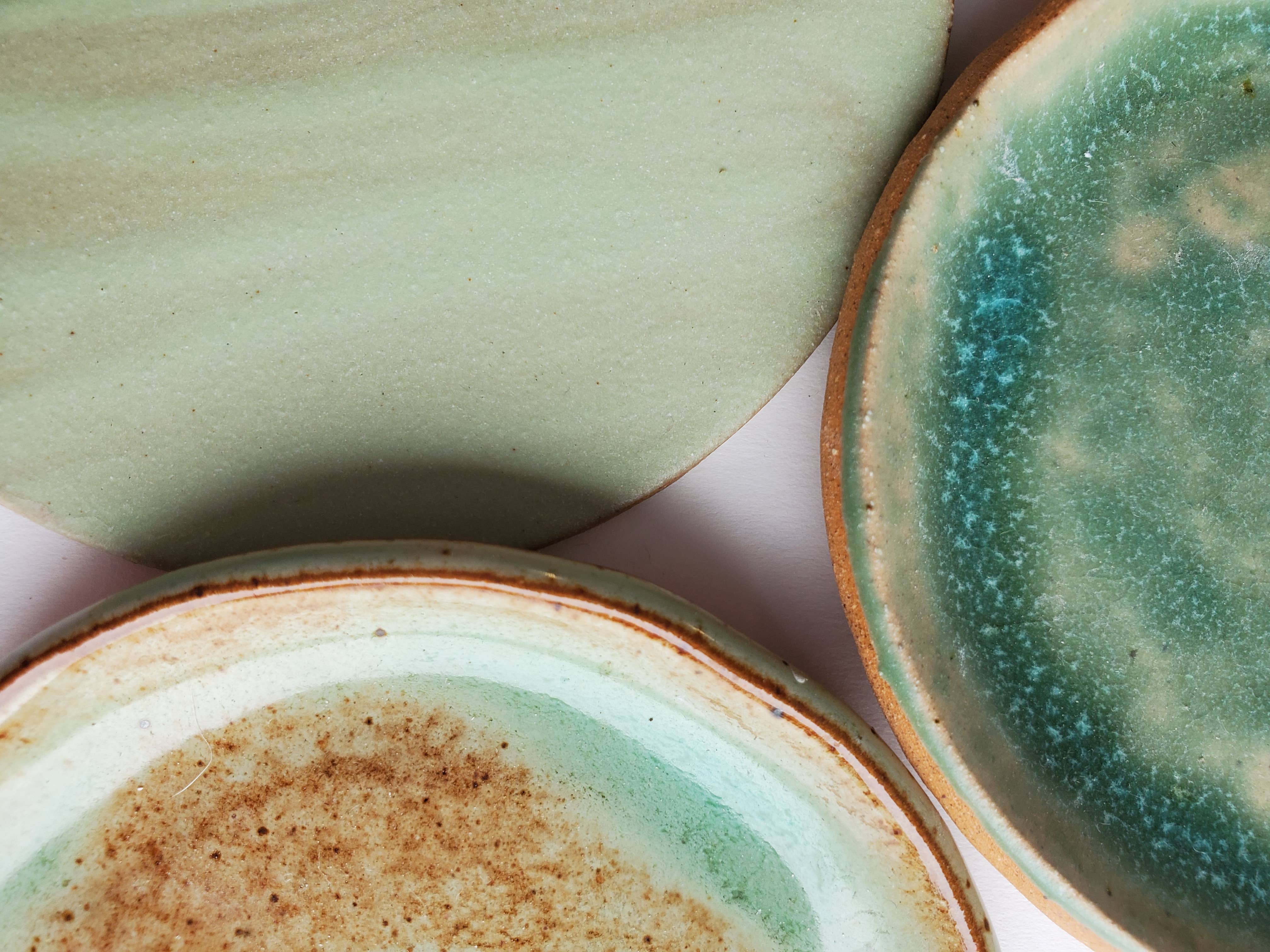 Cactus ornament featuring soft green and earthy tones with a textured ceramic finish in a stylish arrangement